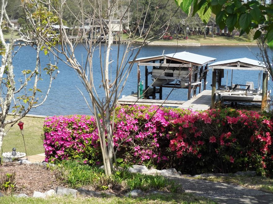 Prime waterfront home on Cinco Bayou.This home boasts four bedrooms and three full baths. There is a separate room that would make a good hobby room or office. The design of the house allows for wonderful views of the heated, enclosed pool and the bayou. The flow of this home makes entertaining easier.This high lot looks down on the bayou and the newer deck and walk make for a nice stroll to the dock with two covered boat lifts. The dock has water, power and a sink area.The seawall is professionally built. The interior starts with a tiled foyer that leads to either the formal living room and formal dining room or the open area being used as a family room, breakfast room and kitchen. The formal areas feature a fireplace, custom built in display areas and privacy. The family room area has access to the pool along with views of the pool and bayou.The two wings accommodate the bedrooms. One side features the master suite with separate area for a double vanity and closets. The other area features a full tub and shower combination. The master bedroom has access to the pool area and beautiful views of the bayou. This wing features another full bath and a room that is currently being used as a large closet. This might make a good hobby, office or master bedroom area den. The other side of the house features a nice laundry room, three more bedrooms and a full bath. One of the guest bedrooms enjoys a view of the bayou which might make it hard for your guests to leave. This area also has access to the enclosed pool. In addition, there is an exterior greenhouse and the two car side entry garage. An 8'x11' storage shed adds to the numerous features. A lawn pump and irrigation system assist with yard care.