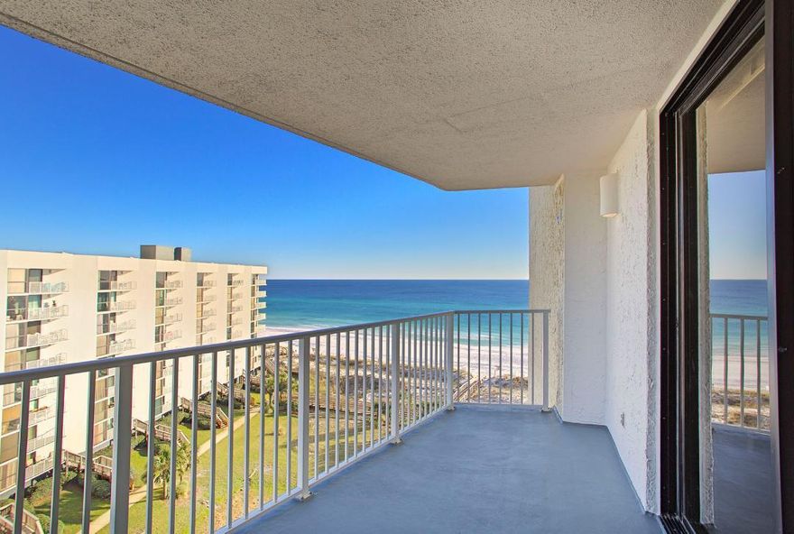 This beautiful top floor vacation rental is within Mainsails 15 acre beachfront family resort. It has accommodations for 6 with two bedrooms, two bathrooms and a sleep sofa. A corner window will captivate you as it looks out over the pool, resort grounds and to the glittering gulf.  Two sliding glass doors lead to the spacious balcony. Wall mounted TVs, a raised square table, four bar stools vaulted ceilings with sky lights that you can only get with a top floor unit are just a few of the comforts you'll enjoy. The bright open kitchens has new appliances and is fully supplied with all the conveniences of home. The master has a flat screen TV, king bed, ensuite bath and sliding door to the balcony, The guest bedroom has a flat screen TV, queen bed, private door to the bath and a window.