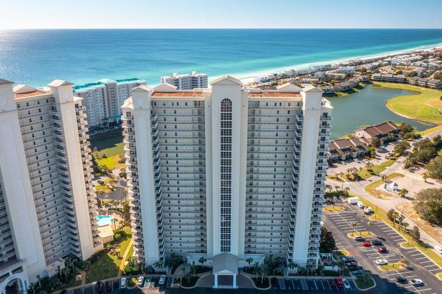 Beautifully fully furnished with amazing views! Enjoy sunsets on the large balcony overlooking the Gulf.This 3/3 condo has updated tile throughout entire unit. All furniture and appliances come with unit! Onsite amenities include a dry and steam suana,gym,3 pools,cable,internet,quarterly pest control.Other amenities within Seascape include 4 other pools,Tennic and pickle ball courts,basketball court,Great for a primary residence, a second home or a Vacation rental with projections topping $50k gross. Water heater replaced in 2020.Air Conditioner replaced in 2016.