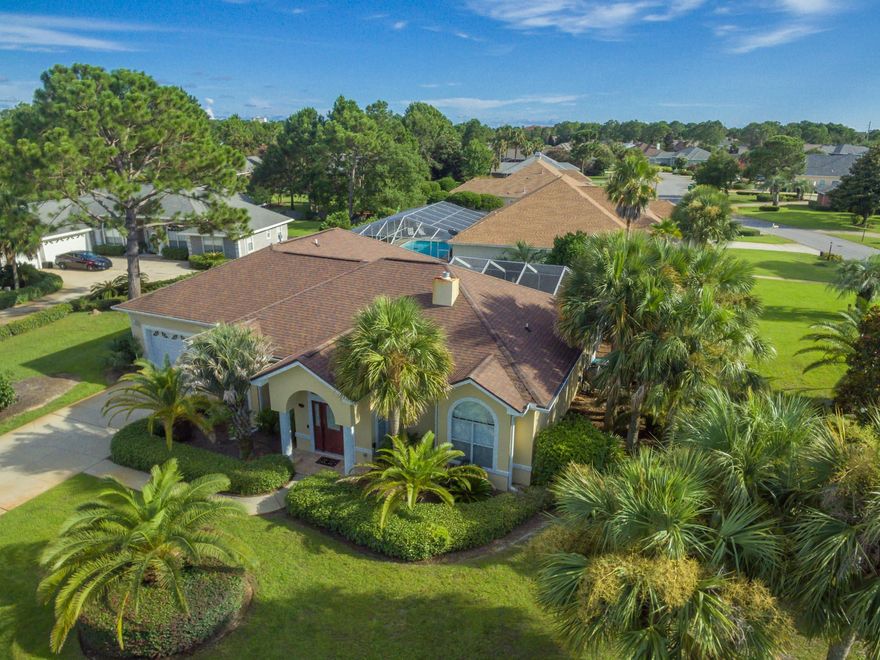 Tucked inside the gated golf community of Emerald Bay, this recently renovated home with a screened in pool, is convenient to all of Destin shopping, beaches and restaurants. The neighborhood offers tennis, golf, and quiet streets perfect for walking and biking. Every detail in this home is perfect. All the rooms, closets and ceilings, including the garage and the exterior of the home have been recently painted. The entire home has new flooring. Recent kitchen remodel includes a new gas top cooking area. Both bathrooms are completely redone with new showers, vanities, toilets, lighting and custom cabinetry. The fireplace has been refaced. New counter tops in laundry room. New french doors in the den and hallway. All new brushed silver hardware, including door knobs and hinges.