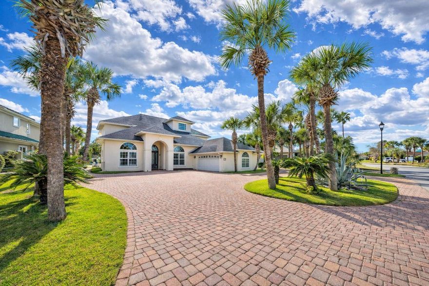 Tucked behind the private gates of the Bay Point community, this 4 bedroom, 4.5-bath WATERFRONT residence with PRIVATE POOL captures the essence of elevated coastal living in Panama City Beach. Offering more than 3,600 square feet of thoughtfully reimagined space, this home blends timeless design with a lifestyle centered around the water and includes a sunroom, TWO bonus rooms and a covered balcony overlooking the water. From the moment you enter, soaring ceilings and tranquil canal views set the tone for casual, laid-back Florida living. Natural light fills the open-concept living areas, seamlessly connecting indoor comfort with the waterfront lifestyle. 
The fully renovated modern kitchen is both striking and functional, featuring a 48-inch range, waterfall-edge quartz countertops, an oversized island, three ovens, wine refrigeration, and a beautifully appointed scullery, perfect for effortless entertaining.

The main level offers two spacious primary suites, including a waterfront primary suite with dual walk-in closets along with a junior primary suite ideal for guests who desire to live on the main level. 

Upstairs, you'll find two additional bedrooms, one with an en suite bath and one with a bath accessible to guests. The upper level also features TWO oversized flex bonus spaces that easily adapt to your needs, whether a home office, fitness studio, media room, or additional flex space. 

Step outside to your own private tropical waterfront retreat. The saltwater pool invites relaxed afternoons and summers filled with fun. A private dock with composite decking and a 7,000-pound boat lift places your vessel just steps from your back door, making it easily accessible and ready for a quick ride to Shell Island or open bay and Gulf waters within minutes. The enclosed Florida room with wet bar offers year-round enjoyment and the perfect vantage point to take in the views.

A pavered driveway provides ample parking for guests, while the 2.5-car garage accommodates vehicles, water toys, and even a golf cart, perfect for exploring the golf-cart-friendly streets of Bay Point, which this community prides itself on! 

Life here extends beyond the home. Enjoy mornings on the Nicklaus-designed golf course, afternoons at the marina or yacht club, and evenings dining along the coast. This is more than a residence, it's a gateway to resort-style waterfront living behind the gates of Bay Point.