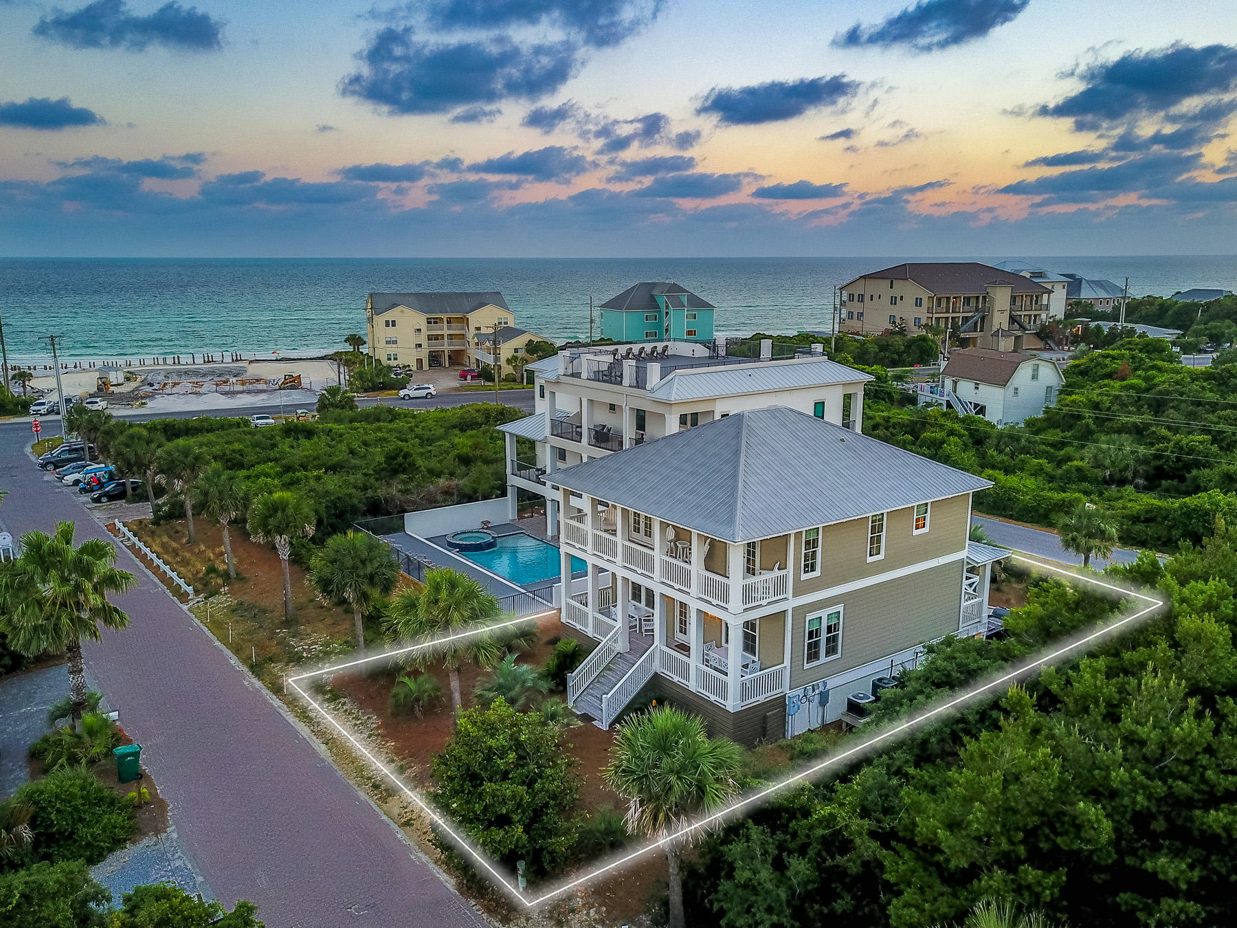 Welcome to 52 Hilltop Drive, conveniently located in the heart of Santa Rosa Beach. This luxurious home offers two master suites, as well as four additional bedrooms and five additional bathrooms- which altogether sleeps 15 people! Perfect for entertaining and for visiting family and friends. Enjoy the breathtaking Gulf, lake and beach views from the spacious, covered balconies. With a private pool and nearby public beach access, this home is perfect as a primary residence, vacation rental, or second home! Enjoy the crystal clear water and sandy white beaches- just across the street! Hilltop Heaven can host your beach vacation desires, and more. Hilltop Heaven features stunning views of the dune lake behind the home, and gorgeous views of the beach and Gulf from the front.