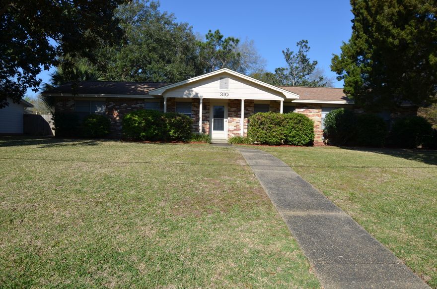 Come look at this all brick home located on a corner lot just steps away from a neighborhood park in great condition. Large fully fenced back yard boasts a HUGE 16'x24' workshop with electricity as well as a convenient parking pad inside the fence. The home features 2 living rooms, 3 bedrooms, 2 bathrooms and a large screened porch. Pets allowed. Call today to schedule a showing!