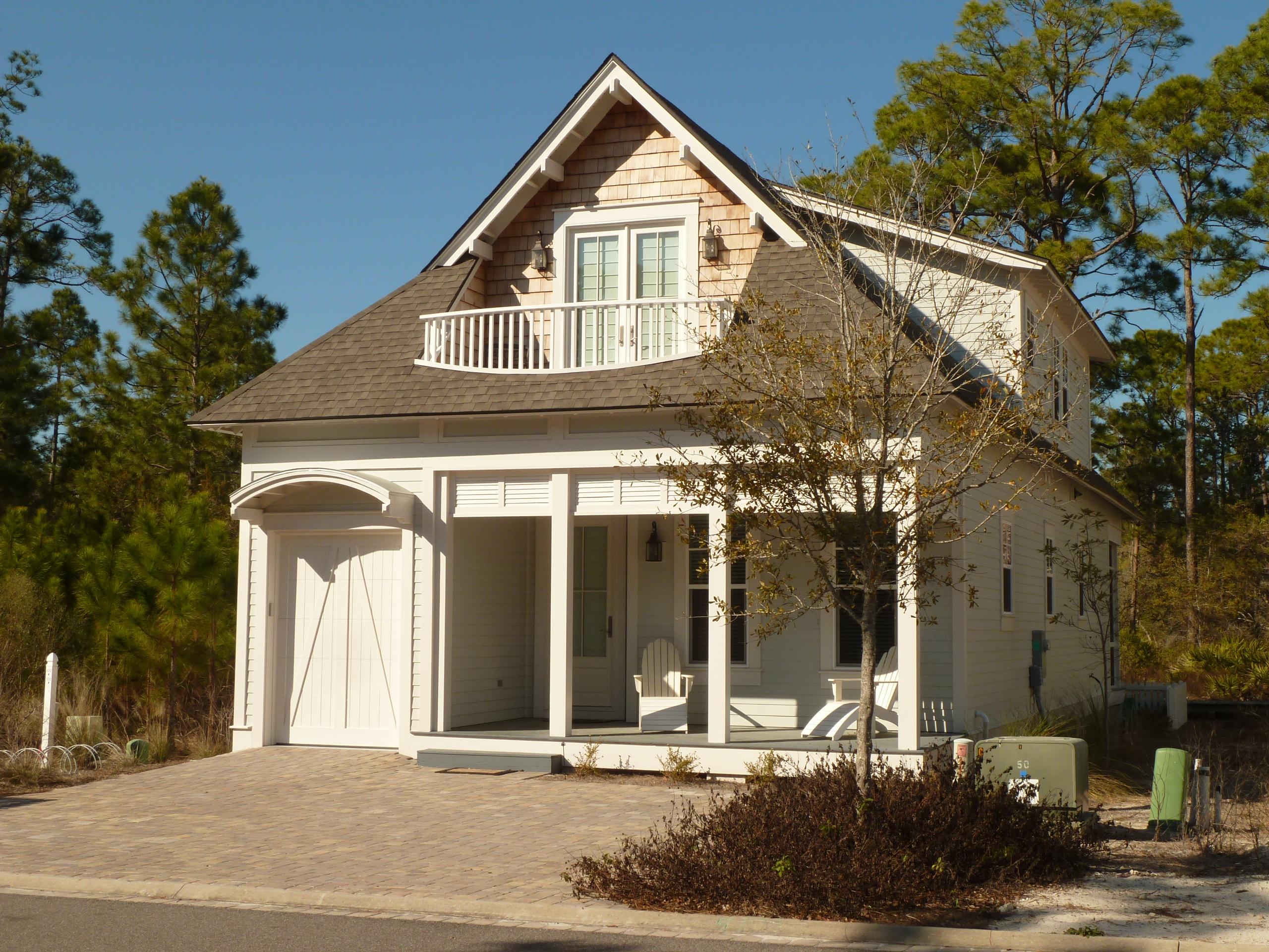 This recently completed home is perfectly situated just steps from the West Beach Pool and the boardwalk to the beach. This fully furnished residence offers three bedrooms,three and one half baths and bunk area. On the first level is a guest bedroom, laundry, screened porch and the living, dining and kitchen areas. The second floor has two additional bedrooms plus a bonus bunk area. The interior finishes include a pecky cypress ceiling, wood floors, custom cabinetry, detailed millwork and much more. WaterSound West Beach is a gated neighborhood located on the south side of 30A with deeded beach access and multiple parks.