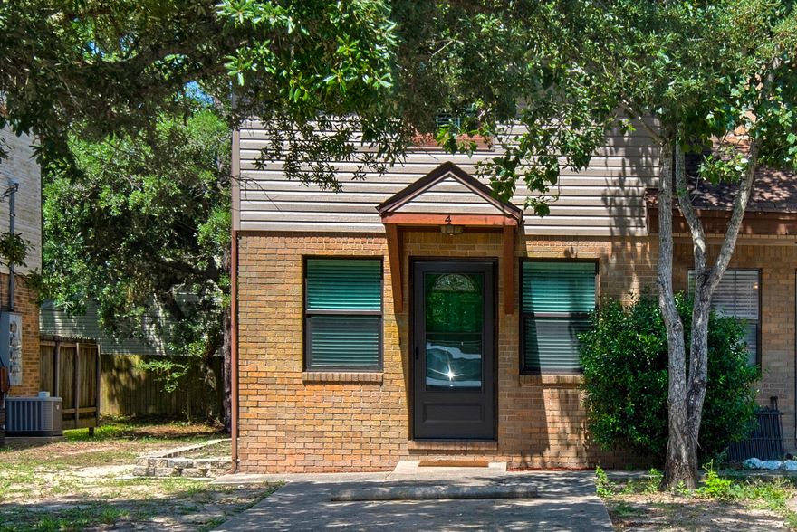 Dazzlingly clean! Bright! This townhome has had almost everything upgraded, so you don't have to! BRAND NEW MAY 2022 - new air conditioner, new gas hot water heater, new gas oven/range, new dishwasher, new refrigerator, new microwave, new paint including removal of popcorn ceilings, new master bedroom laminate floor, new storm doors, new thermostat! That's over $22,000 in upgrades! Storage? Yes! Two very deep closets, one under stairs and one in second bedroom, plus two hall closets, and double closets in Master Bedroom! The roof is only six years old! Windows were replaced with tilt-out. All floors are laminate or tile. Lovely shaded back yard with shed wired with electric.  Convenient to Eglin Air Force Base and numerous restaurants, parks and the beach! There are no association fees.