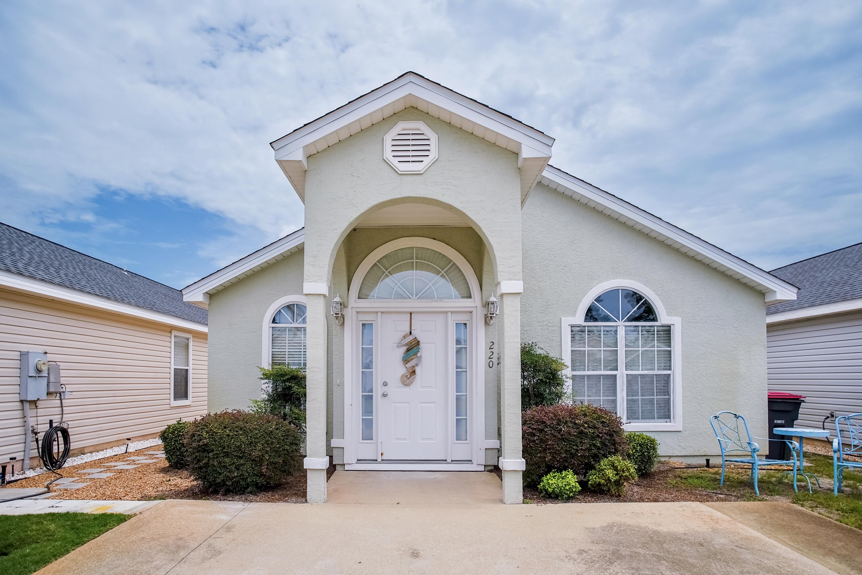 Tucked away in the neighborhood of Palm Cove, this inviting 3-bedroom, 2-bathroom beach house offers the perfect blend of comfort and convenience, just a short drive from the beach.The cozy living room creates a welcoming atmosphere for unwinding after enjoying a day on the nearby white sandy beaches. The living area opens to the kitchen making it perfect for preparing meals or entertaining guests.The master bedroom is complete with a walk-in closet and an en-suite bath. Two additional bedrooms offer flexible space for family, guests, or a home office, while a second full bathroom ensures comfort and convenience for all. This home's low-maintenance surroundings make it an easy choice for those looking to enjoy a relaxed, coastal lifestyle.