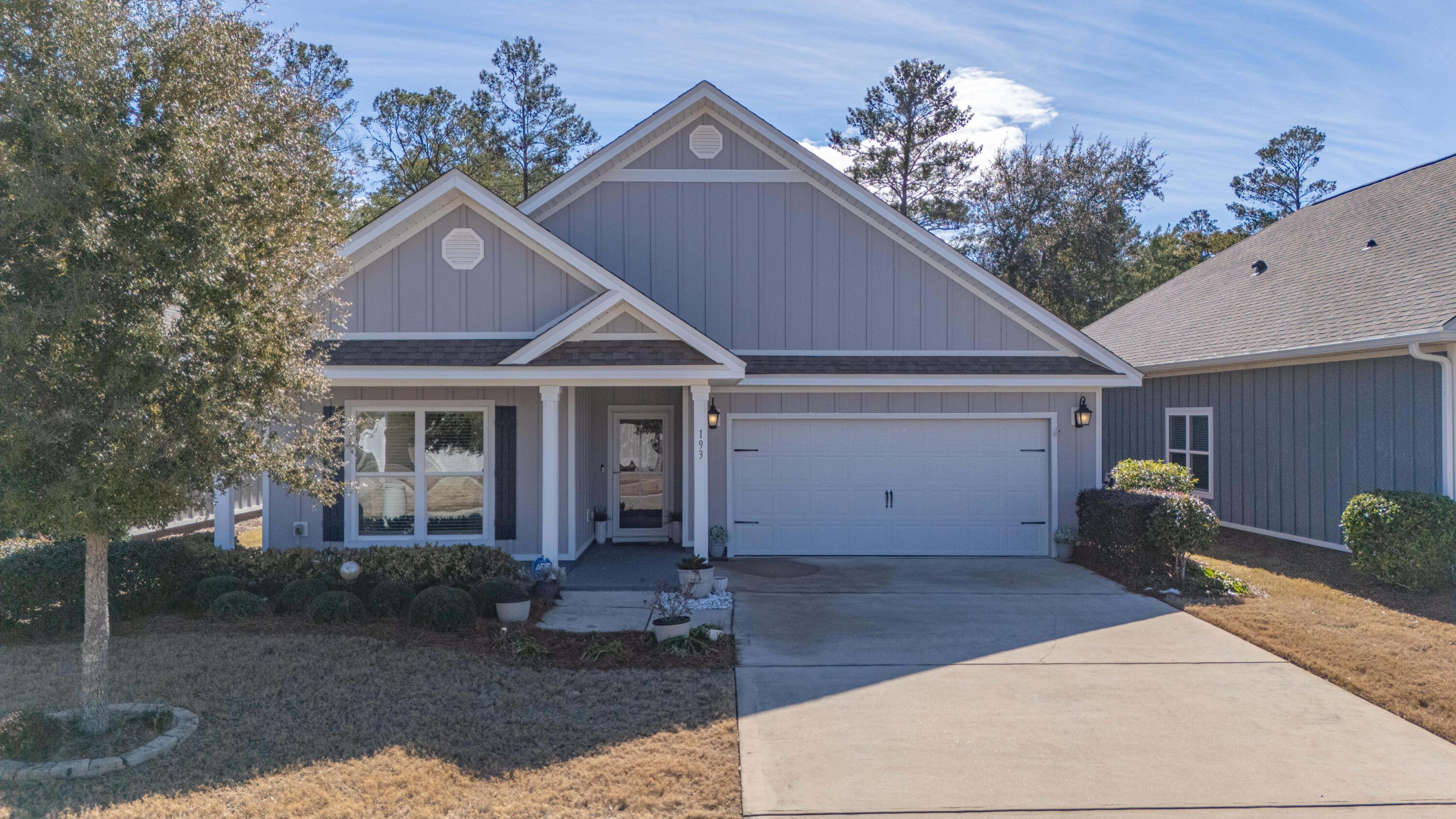 Welcome to Hammock Bay, providing a luxurious style of life with community pool, Pickleball courts, professional landscaping, and so much more! Check out www.hammockbayfl.com This gorgeous modern home is full of many upgrades, including custom cabinet & closet organizers throughout the kitchen and walk-in closets.Featuring luxury vinyl plank floors throughout in a color tone that will work with whatever style you bring! Generously sized great room, offering plenty of room for the family and open floor plan perfect for entertaining. Kitchen is open to the living space and boasts a breakfast bar, pantry and all stainless steel appliances. Large master bedroom with double vanity, walk-in shower that has been tiled and well appointed master walk-in closet with all of the niches you could want coordinate and organize your space The home features two additional bedrooms and guest bathroom, which are split from the master bedroom at the front of the home The laundry room will make it feel as though you're not doing so much of a chore as it is a perfect space to create into your own desires. There is a screened in porch to enjoy the Florida evening and offer an additional space for seating during gatherings.