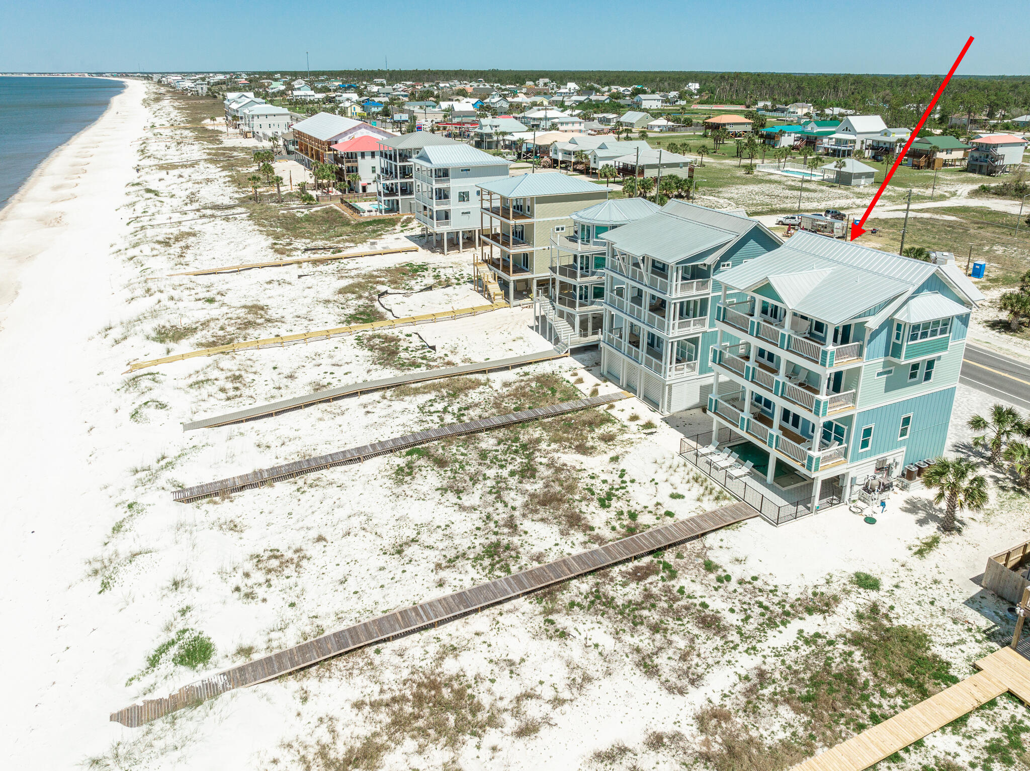 This is one of if not the nicest homes from Mexico Beach to St. Joe Beach. The owner of this custom home spared no expense & skipped no attention to detail in this incredible home. There hasn't been a home of this class listed before in this area. Beachfront pool with outdoor bathroom/outdoor shower & oversized boardwalk plus elevator access on floor one. Floor two is a kitchen and living area to die for with unbelievable features & Bluestar appliances, custom lighting, trayed ceilings, wood framed 80' TV, and more. The next floor features 2 large gulf facing suites plus a bunk room w/full bath. Top floor has a full br/ba and then one of the most impressive master bedrooms and huge master baths you'll ever see. The furnishings are also exquisite & the home is sold fully furnished.