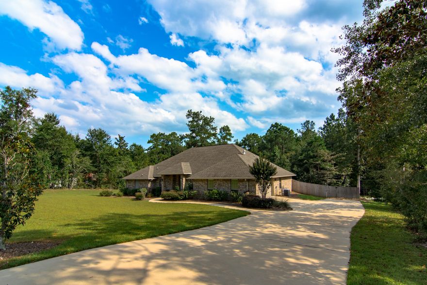Nothing missing in this beautifully maintained 2012 built home. A beautiful 8ft door greats you at this 5bd/2ba home. Features a large dining room with all the details and touches throughout you could want. 10 ft ceilings. Built in wine bar, boutique pantry door, beautiful granite and island in the kitchen, gas range, all stainless appliances. The oversized master bedroom is a must see with access to the covered porch. Built in jewelry and clothing stand in one of the two closets. Bathroom features custom cabinetry for extra storage. Oversized garage space. Enjoy quiet evenings on your covered back porch. Sellers have installed rain barrel system to catch gutter spouts and continue watering. Fenced in, 1 acre lot. 1 yr AHS warranty for buyer!