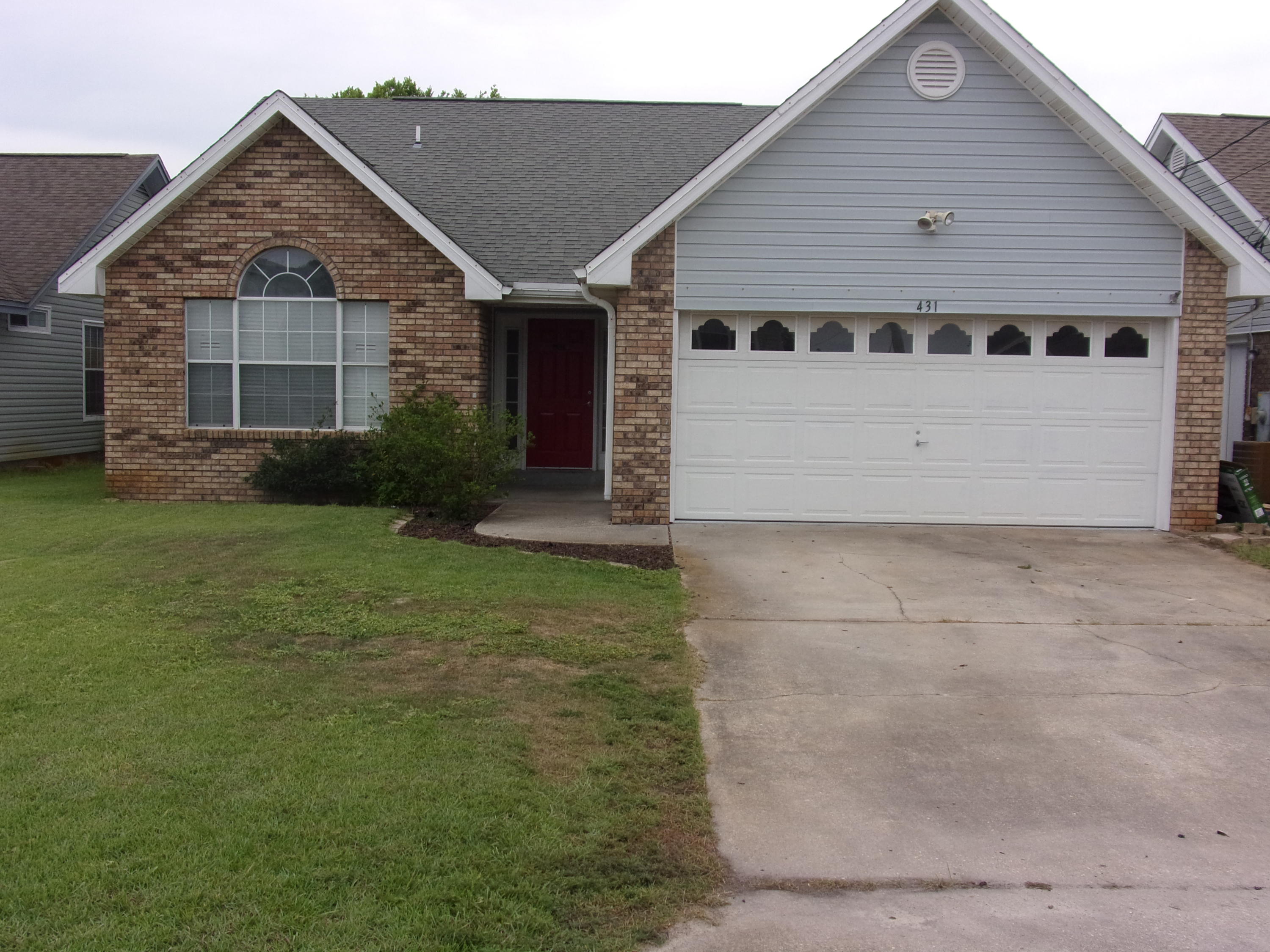 Upgrades Galore! Close to Hurlburt Field Base. Wood floors throughout-no carpet! Slate look tile floors in both bathrooms. Upgraded light fixtures & ceiling fans. High Cathedral ceilings in living room. Cozy fireplace and double back doors w/blind inserts accents the living room. Renovated Custom kitchen cabinets with built in wine cabinet & wine refrigerator. Quartz counter tops & stainless steel appliances. Custom built benches w/extra storage. Large pantry. Separate Dining area. Master bedroom has high ceilings and large bay window. Large walk in closet w/extra shelving. Master bathroom has double vanities, whirlpool tub & separate shower. Split bedroom floor plan. Garage has pull down stairs & sink. Fenced backyard with sprinkler system & lawn pump. AC 2015 MUST SEE HOME!!