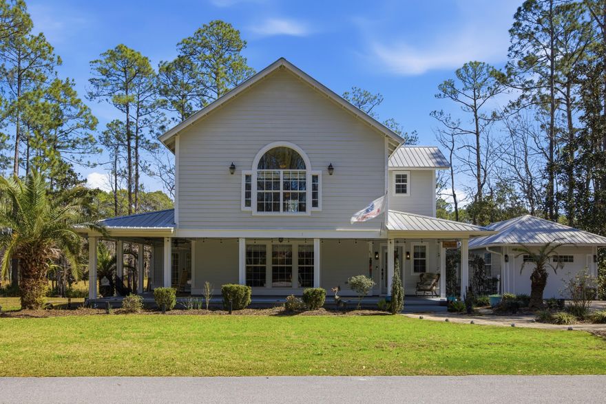 Tucked away in a quiet enclave of custom-built homes, this large-lot property offers rare privacy with surrounding vacant parcels and minimal through traffic. A welcoming wrap-around porch sets the tone for relaxed living and peaceful mornings outdoors. Inside, the expansive open floor plan is filled with natural light from abundant windows framing serene views of mature trees and Lagrange Bayou. The Tuscany-style kitchen anchors the spacious living and dining areas, ideal for gatherings and everyday comfort. With generous living space and seamless indoor-outdoor flow, this home blends function with tranquility. Centrally located between Eglin AFB and Tyndall AFB, and just minutes from the white sand beaches and emerald waters of the Gulf, this home checks all the boxes! Come see it before it's gone!