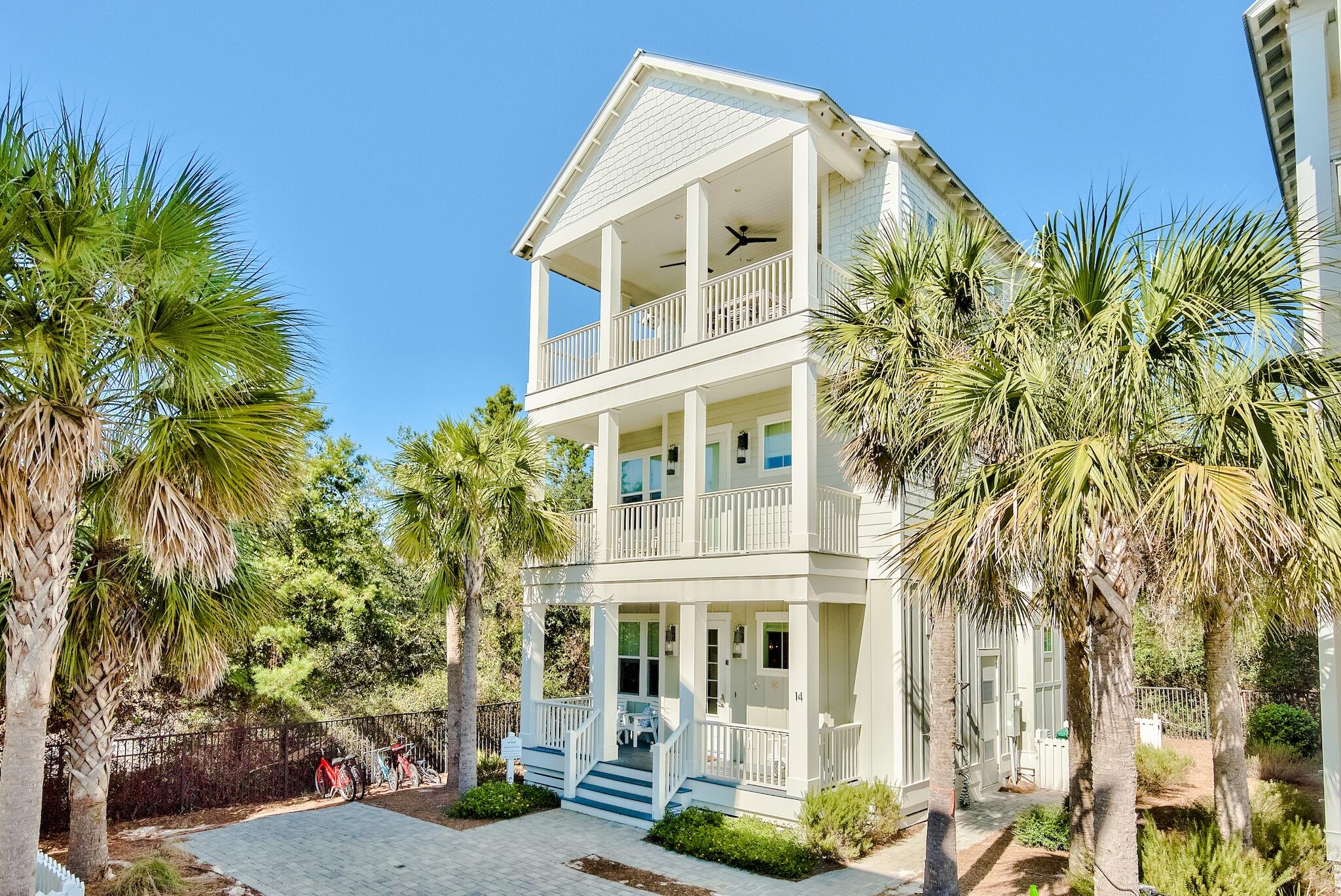 RARE OPPORTUNITY this close to the beach under $2M! This is the quintessential beach retreat and rental investment with rental projections from $125-145k, this furnished 4 bedroom, 4 bath, a block to the beach, close to the community pool, Rosemary and 30Avenue with many restaurants and shops to enjoy! Features include 10' ceilings, shaker style wood cabinets, white oak stained floors and tile throughout, wood shiplap and wainscoting.Adorned with high end features and furnishings, a guest bedroom on the first floor, and a 3rd floor bonus space with an outdoor summer kitchen and gathering area; this is the perfect beach home for entertaining.