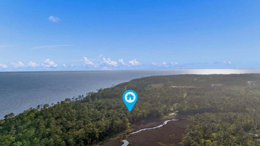 Welcome to your slice of waterfront paradise in the heart of Freeport, Florida! This lot offers breathtaking views overlooking a natural salt marsh, providing a serene backdrop for your dream home. Nestled on a quiet cul-de-sac with mature trees, you'll enjoy peace and privacy while still being close to the vibrant community. Connected to the Intracoastal  Waterway,  Lagrange Bayou offers endless opportunities for waterfront living.  Centrally located for easy access to Grayton State Park, South Walton Beaches, major highways, schools, and the Freeport Regional Sports Complex, you'll have easy access to all the area has to offer. With underground utilities, these lots provide the perfect canvas for your coastal retreat.  Lots 22 (948127) and 23 (948129) also available but sold separately.