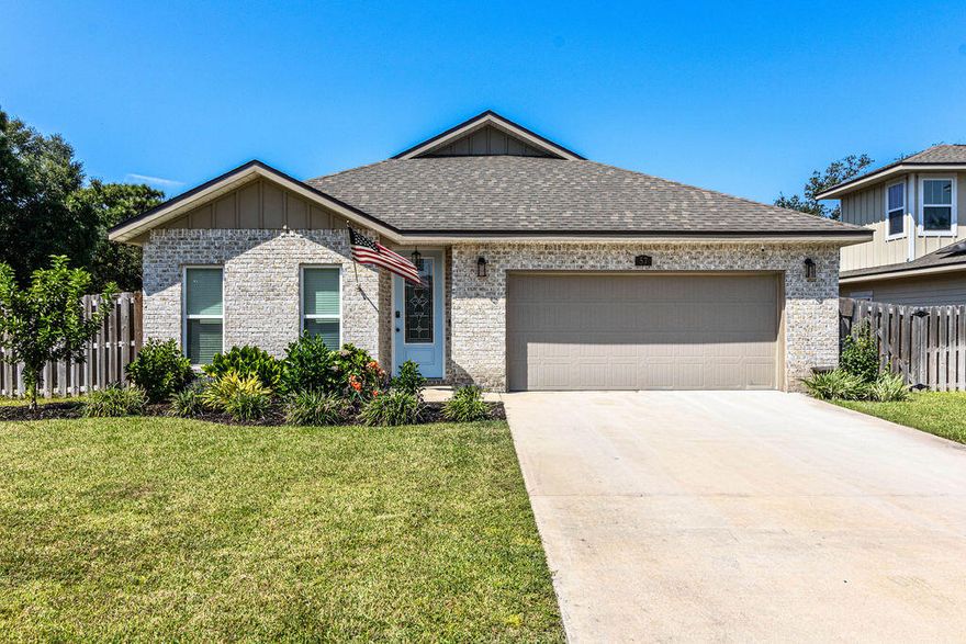 Introducing ''Temple Park at Port Dixie'', a 40 lot development is Shalimar with both underground utilities and broad sidewalks. This beautful home is located close to bases, beaches and boat launchs.  This 4BR/3BA,  custom brick home has 10 Ft. ceilings w/ impressive crown molding, LVP flooring throughout most of the home, tile in the master bath, and 5 1/4'' baseboard throughout. Kitchen boasts custom painted Bisque cabinetry, granite countertops, a large pantry, and stainless appliances. Master suite is in the right rear of the home, is very roomy, has 2 large walk - in closets, a marble walk - in shower with glass enclosure, a whirlpool garden tub and double vanity.