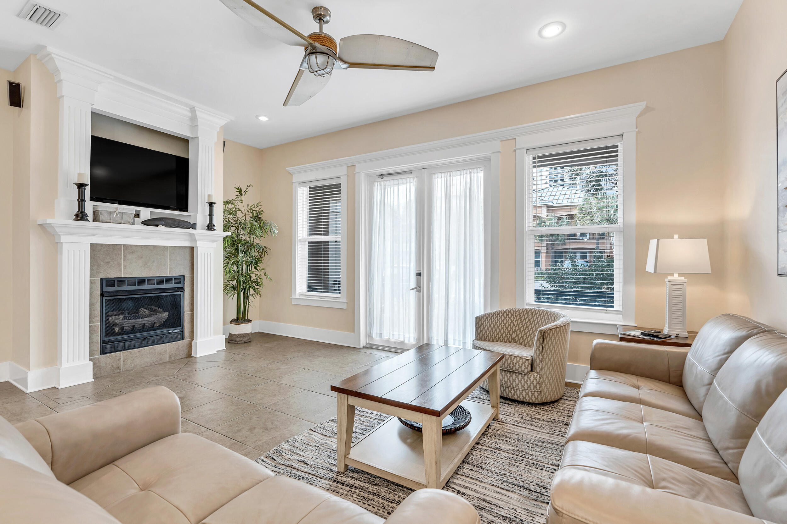 Just steps from your DEEDED PRIVATE BEACH ACCESS and very private community pool. This 3 bed/3 ba is tastefully decorated with all the comforts needed to make it your home or investment property. This is one of the few properties that are VA and FHA approved. Dedicated parking right outside, no need to wait on elevators. The first floor welcomes you with open living, dining and kitchen with a fireplace. There is also a bedroom and full bathroom. On the second floor is the primary bedroom and bathroom and the second guest bedroom with a full bath.