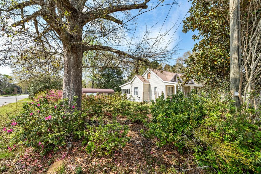 A COMPLETE FAIRYTALE COTTAGE LOOK!! This charming home was passed down generational and is ready for a new family to fill with love! The expansive front porch with the dormers is so charming and gives that fairy tale look with the mature trees and flowering bushes! This sizeable cottage has tons of storage with all the classical cubbies and closets that these historic homes are known for. There are 2 sizeable living spaces first floor, perfect for creating a more personal atmosphere. The options for the spaces upstairs are amazing! Grab this sweet property right in the middle of this rapidly growing Baker area before its gone! Contact your favorite realtor today to view this sweet home! Motivated seller!