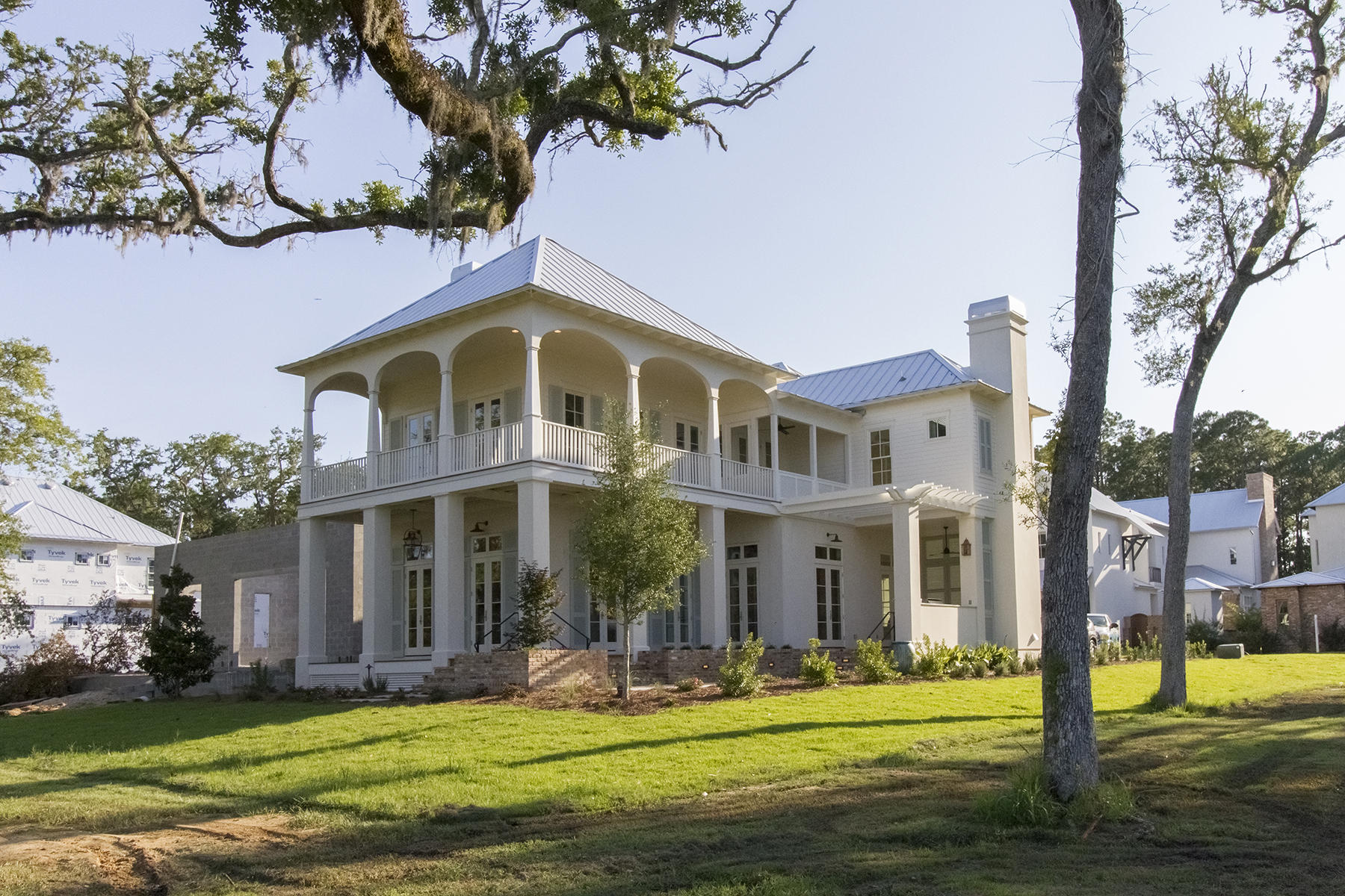 New Construction & 2016 Parade of Homes winner featuring spectacular bay views; this incredible Low Country style custom home continues the tradition of amazing architecture in Churchill Oaks. Located on the best interior lot in Churchill Oaks, 46 Bennett has every amenity you desire from generous outdoor living, a louvered lanai, outdoor fireplace, and 2nd floor sleeping porch. The open interior floor plan features the finest fixtures and finishes available, white oak floors throughout living and bedrooms, marble baths, and spectacular views from every room. Churchill Oaks is the perfect place for families to gather, interact, and call home. Call today or stop by Churchill Oaks for more information!