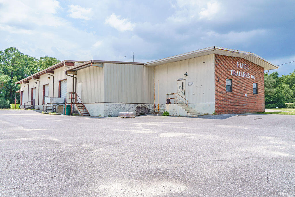 Just 1 1/2 miles from Hwy 85 and 12.5 miles from Hwy 285, This light industrial use property encompasses 2 parcels combined to make just over 4 acres. The main building is 8603 sf with 6850 heated and cooled. This building has 4 loading docs. A separate building is 2982 sf with 1491 heated and cooled. It is currently being used for storage of parts. The entirety of the property is currently secured with a fencing with a rolling gate that remains secured off peak hours. Inside there is a waiting/parts area, several offices and a restroom. With 600 LF of road footage this properties uses are endless.