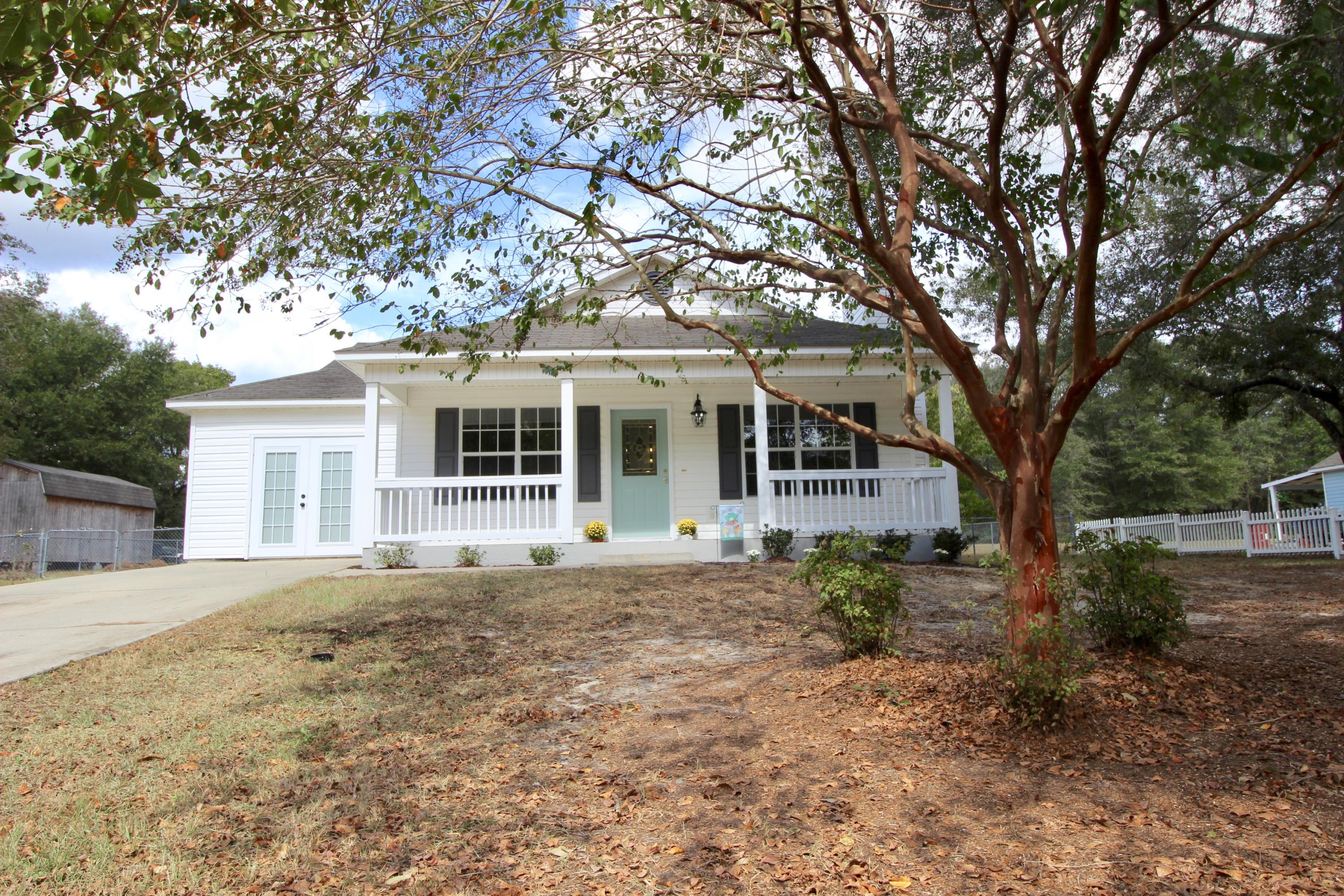 Completely renovated and updated just for you! Brand new kitchen with white shaker cabinets and new SS appliances. New vinyl plank floors and all new paint. Kitchen is open to breakfast area and living room with fireplace. There is also a den/future 4th bedroom with its own entrance - perfect for college students or multigenerational families! Large half acre lot across from Juniper Lake viewed from your covered front porch. Fenced back yard with detached garage/workshop and paver patio. There isn't a neater, cleaner home on the market today - don't wait to make it yours!