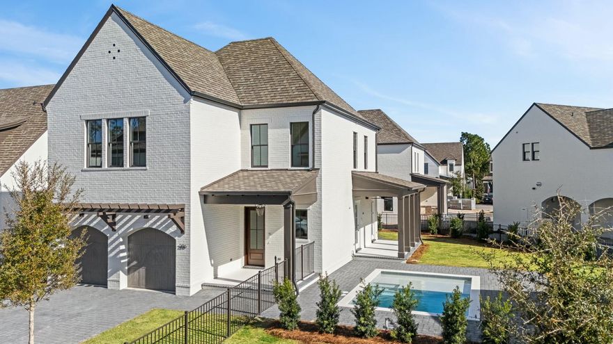 Welcome to 286 RidgeWalk, a stunning new construction home that combines luxury, comfort, and privacy in the highly sought-after RidgeWalk community. Nestled on an expansive pie-shaped lot, the property features a beautifully landscaped and fenced yard with a private pool, a cozy firepit, and lush greenery, creating a serene outdoor retreat. Inside, the first floor showcases wide-plank wood floors, a cozy gas fireplace, and two covered porches that seamlessly blend indoor and outdoor living. The chef-inspired kitchen is a showstopper with Woodharbor cabinetry extending to the ceiling, Cambria countertops, a striking accent island, and high-end Fulgor Milano appliances, including an oversized gas cooktop. A gorgeous marble backsplash with gold accents completes this elegant space. Just off the kitchen, a working pantry with a sink and beverage fridge offers extra convenience, while a well-designed drop zone connects the home to the two-car garage with epoxy-coated floors.

This home is one of the rare properties in RidgeWalk to feature an elevator, providing effortless access to all levels. It is equipped with wiring for a future generator and an installed central vacuum system, adding to its modern conveniences. Upstairs, the primary suite is a tranquil haven, featuring a vaulted ceiling with a cedar beam, a shiplap accent wall, and a spa-like bath with a crushed stone tub and marble and gold accent tile. The custom-designed closet by Tailored Living blends sophistication with functionality. Two additional guest bedrooms share a Jack-and-Jill-style layout, each with its own private toilet room and sink, connected by a shared shower.

286 RidgeWalk is a rare gem that offers timeless elegance, thoughtful design, and resort-style living. RidgeWalk is a gated, non-rental, French-inspired community just a quick stroll away from the beautiful waters of the Gulf Coast. Don't miss this opportunity to own an extraordinary home in one of the area's most desirable communities. Schedule your private showing today.