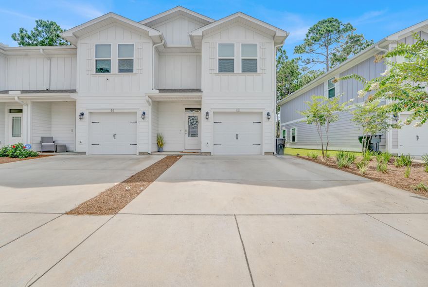 SHORT SALE. Embrace coastal living with this 100% turn-key townhome, fully furnished and ready for you to move in! It includes furnishings, appliances, kitchenware, linens, a grill, artwork, decor, and even a ping pong table for added fun. Nestled in a quiet and serene setting, this home offers a spacious living area, a modern kitchen, and peaceful views of the preserve. The cozy patio, complete with a grill, is perfect for relaxing or entertaining friends and family. Conveniently located near the beach, hospital, shopping, and dining, it's just a short stroll from all the local amenities. Whether you're seeking a tranquil retreat, a family-friendly getaway, or a smart investment, this is your chance to own a piece of coastal paradise!