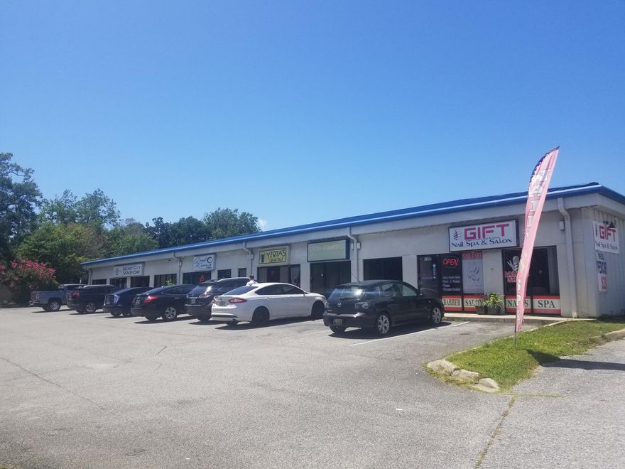 High visibility retail unit that is located right on Hwy 98. Open floor plan with one office in the back and one restroom. The unit was previously occupied by Cash Advance.