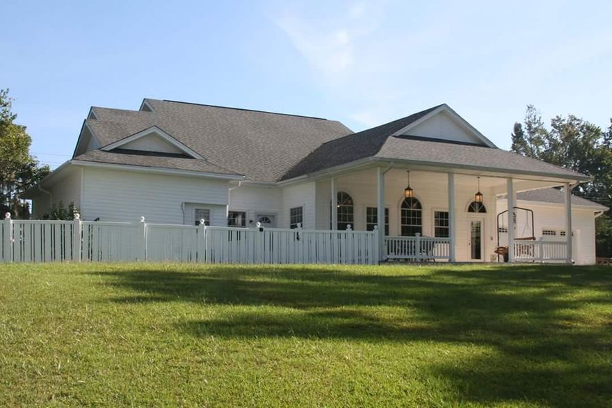 Now is your opportunity to own Jacksonview Cottage, currently operated as a vacation rental but could easily be used as a private home. Located in Florala, Al with absolutely spectacular views of Lake Jackson.This residence features 3 bedrooms, each with an on-suite bathroom. Formal Living Room and Dining Room plus upgraded kitchen, family room, den off of bedroom 3 and Florida Room. Separate entrance to bedroom 3 and den. Over 400 sq ft of covered deck to enjoy the views of the Lake and afternoon breeze. Seller recently added an over-sized 2 car garage. Beautiful original hardwood floors plus decorative concrete and ceramic tile floors. Home was originally upgraded in 2006 with current owner again upgrading in 2013. Perfect for enjoying Southern Small Town Lakefront living.