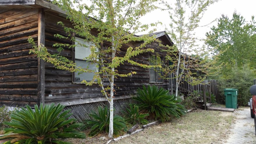 Three Bedroom, two bath double wide mobile home with fireplace Located on a 1.18 acre lot. This home has two living areas; one with a fireplace, and two eating areas. The kitchen has a center island and lots of storage. All bedrooms are good size with walk in closets. Master bath has a garden tub and a shower. The house is all electric and has a septic system. There is a large storage shed in the back of the house. All property is being sold in ''as is'' condition. All dimensions to be verified by the buyer. Property is zoned R1M, mixed residential subdivision.