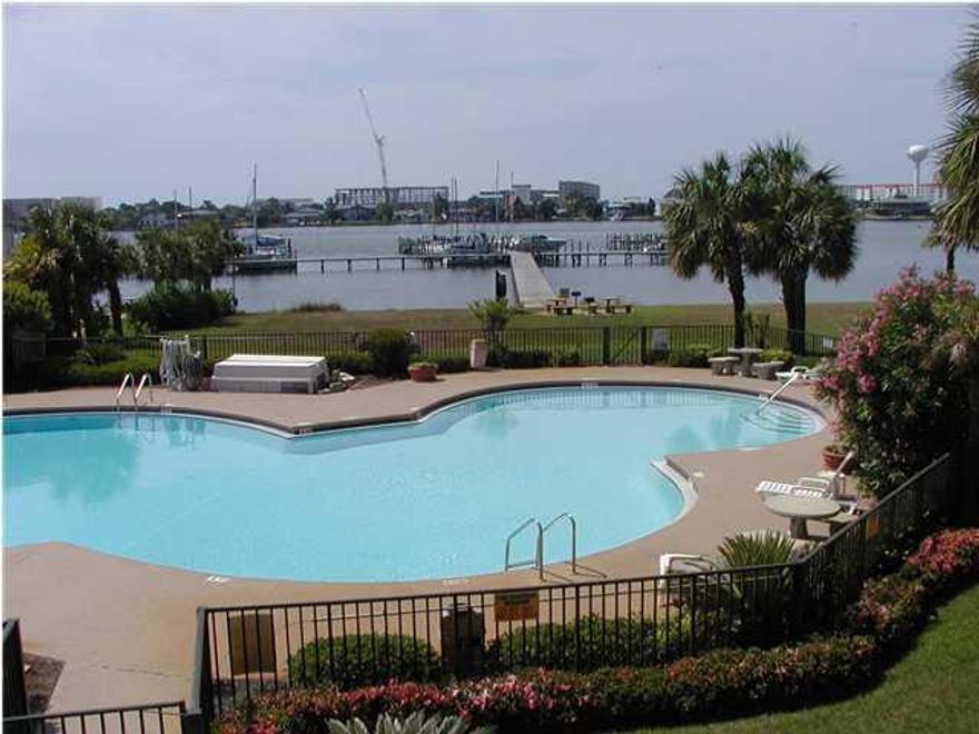 A BEAUTIFUL WATERFRONT CONDO, UPGRADED VERY NICE, AND FULLY FURNISHED. HAVING SLEEPING ARRANGEMENTS FOR 4-PERSONS. NUMEROUS NEW UPGRADES THROUGHOUT.
PLUS WITH THIS PRICE, COMES WITH AN ''ASSIGNED RIGHT TO USE, BOAT SLIP #D18 (36FT). WHICH HAS WATER AND ELECTRIC AVAILABLE,
NOTE: IF BY CHANCE YOU ''NEED'' TWO SLIPS, THE SELLER ALSO HAS SLIP #B02 (40FT), WHICH CAN BE MADE AVAILABLE FOR ADDITIONAL PRICE (NEGOTIABLE)
UNIT IS VERY NICELY UPDATED THROUGHOUT INCLUDING TILE, CABINETRY, VERY NICE FURNISHING, AND PLENTY OF DECOR. YOU'LL LOVE IT.. SUPER COMFORTABLE.
EASY AND QUICK ACCESS TO ALL AMENITIES SUCH AS THE SUPER POOL, THE MARINA, THE BBQ GRILL, THE PICNIC AREA, PARKING, AND EVEN THE SMALL PRIVATE BEACH AREA JUST FOR OWNERS AND CONDO GUESTS/TENANTS.
CLICK ''MORE'' FO PLUS..THE LAWN LOOKS LIKE IT IS YOUR PRIVATE YARD.. AS YOU LOOK THRU THE LARGE PATIO DOORS, OVER THE PATIO, TO THE SUPER SIZED POOL AND OTHER AMENITIES.  

ASSOCIATION DUES INCLUDE:  WATER, SEWAGE, TRASH, QUARTERLY BASIC PEST CONTROL, CABLE TV W/2-HBO'S, HI-SPEED WIRELESS INTERNET, ALL EXTERIOR BUILDING AND GROUNDS MAINTENANCE AS NOTED BY THE CONDO DOCUMENTS; STATE REQUIRED COMPLEX INSURANCE, AND ASSOCIATION MANAGEMENT.

THE PIRATES BAY ASSOCIATION BOARD OF DIRECTORS AND MANAGEMENT, KEEP THE GROUNDS, BUILDINGS AND AMENITIES MAINTAINED AND UPGRADED ONGOING.  THE COMPLEX APPEARANCE  WILL  MAKE YOU PROUD TO OWN AT PIRATES BAY.  

VERY RECENTLY A COMPLETE RESTORATION ON BOTH BUILDINGS "A" AND "B" WAS COMPLETED.  THEY LOOK BRAND NEW..  AND STILL UPGRADING CONTINUES, WITH THE MOVING OF THE WASHER/DRYER AND AND VENDING MACHINES AREAS, MAKING THEM MORE SECURED AND CONVENIENT FOR ALL OWNERS AND GUESTS/TENANTS.

YOU CAN USE YOUR CONDO AND/OR BOAT SLIP FOR YOUR OWN USE AND PLEASURE... OR YOU MAY RENT THEM OUT FOR ADDITIONAL REVENUE, DOING SO EITHER ON A LONG OR SHORT TERM BASIS.  

YES, YOU CAN EVEN HAVE A PET AS AN OWNER, BUT LIMIT IT TO  25LB, AND THE RULES DO MAKE IT IMPERATIVE THAT YOU CLEAN UP AFTER IT, AS WELL AS KEEP IT FROM BECOMING A NUISANCE, RESPECTING YOUR NEIGHBORING OWNERS AND GUESTS.  ALL WANT TO ENJOY THEIR PIRATES BAY HOME, SECOND HOME, OR INVESTMENT.
IF BY CHANCE YOU SHOULD NEED A 2ND BOAT SLIP, THE SELLER IS WILLING TO ALSO SELL HIS SLIP #B02 (40FT) FOR A NEGOTIATED INCREASE IN PRICE.  AGAIN, WITH THE PRICE ADJUSTED ACCORDINGLY.

ASSOCIATION DUES ARE MONTHLY, BUT TO BE PAID QUARTERLY, ON THE 1ST OF EACH QUARTER (JAN, APR, JUL, OCT).  

DO KEEP IN MIND, THERE IS AN ADDITIONAL MONTHLY ASSOCIATION FEE FOR THE SECOND BOAT SLIP OF $127.97  -    CURRENT MONTHLY CONDO FEES ARE $337.55 AND EACH BOAT SLIP FEE IS $127.97  -   CURRENT (MONTHLY) FEES FOR THIS LISTED CONDO AND ONE SLIP  (1-CONDO AND 1-SLIP) ARE $465.52.  BOAT SLIPS THIS SIZE RENT IN THE NEIGHBORHOOD OF $150 TO $250 PER MONTH, PLUS