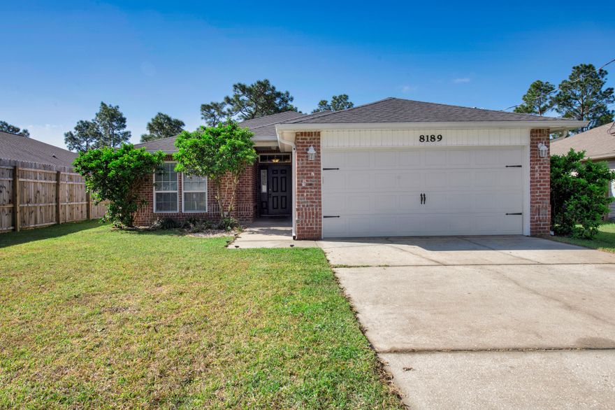 This home is IMMACULATE and ready for YOU!  Step inside this 4-bedroom beauty that has long lasting, wood look tile floors and new carpet in the bedrooms.  The open floor plan works for everyday living & makes a great space for entertaining.  The kitchen is part of the great room and features a 12 ft breakfast bar, granite counters, island, tile backsplash, pantry and plenty of cabinet storage!  This kitchen truly is the heart of the home! The spacious main suite and private bath are just right for relaxing.  Wait until you see this closet! Space for more shoes! Outside, the huge backyard is fenced and divided into 2 zones for all different outdoor activities for people and pets!  You'll also appreciate the newer HVAC system (2020), termite bond protection, gutters and sprinkler system!   Location, location, location!  Only 2 miles to the beautiful white sands of Navarre Beach, 1 mile to Publix and 13 miles to Hurlburt Field!  Take the kids to Navarre Children's Splashpad and Park just down the road or the adults can hop right over to Juana's Pagoda Bar and Grille for waterfront dining. Act fast!!
