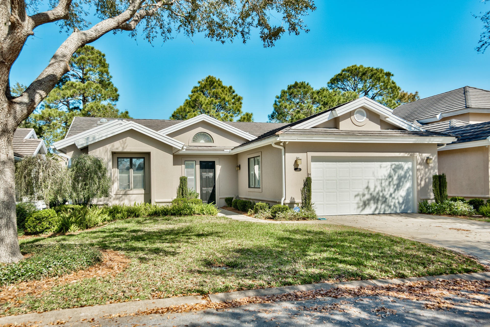 This home has got the WOW! factor. Be entranced by the gorgeous pine-colored flooring throughout the entire living area, expansive views of the lake and 9th fairway of Baytowne Golf, sleek and modern kitchen with white cabinets and light quartz counters, and neutrally painted walls lined with crown molding. This lovey home also features a security system, double car garage, in-ground pool, fenced back yard, and custom built cabinets allowing for an abundant amount of storage space. The owners have taken pride in updating this home with brand new kitchen & bath cabinets, hardware, kitchen appliances, water heater, HVAC, pool pump & timer, garage door and repainted the homes exterior, transforming it into a practically new home! All this and more was completed within the past 2 years!