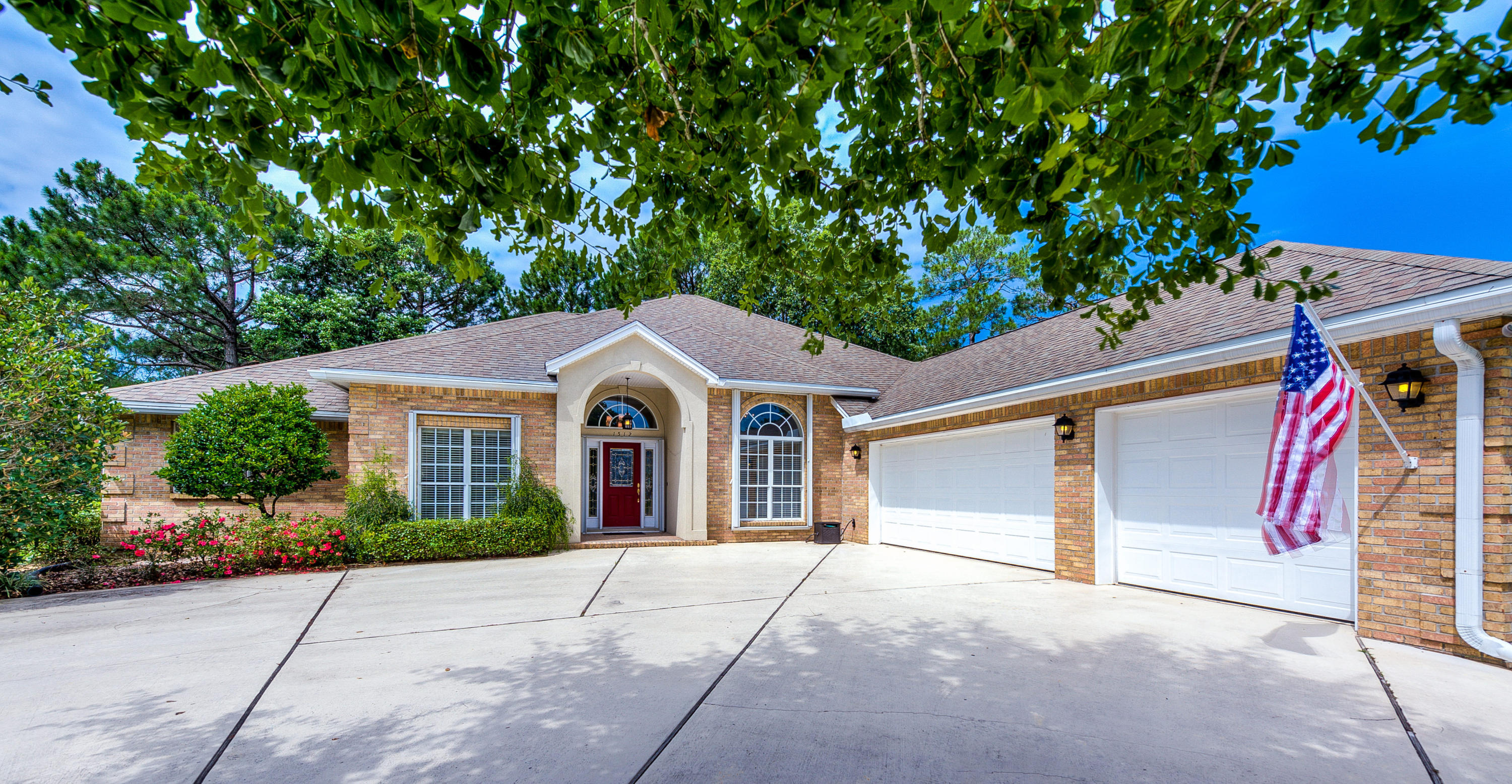 Welcome home to this beautiful custom 4/3 with a 3 car garage located in the exclusive Glenlake neighborhood of Bluewater Bay. Positioned on the 9th fairway of the executive Lake Course this home has been fully remodeled and updated with no expense spared in the process.Upon entering the home you will instantly notice the silver cloud marble in the foyer and throughout the wet areas. on your way to the updated kitchen you will notice the premium engineered wood flooring. Once in the kitchen, the new granite counter tops, updated appliances, gas stove with stainless hood, custom back splash and custom cabinets will command your attention. As you exit the kitchen and pass by the glass fireplace through the spacious living area you will enter the bonus/ theater room. This room has been hard