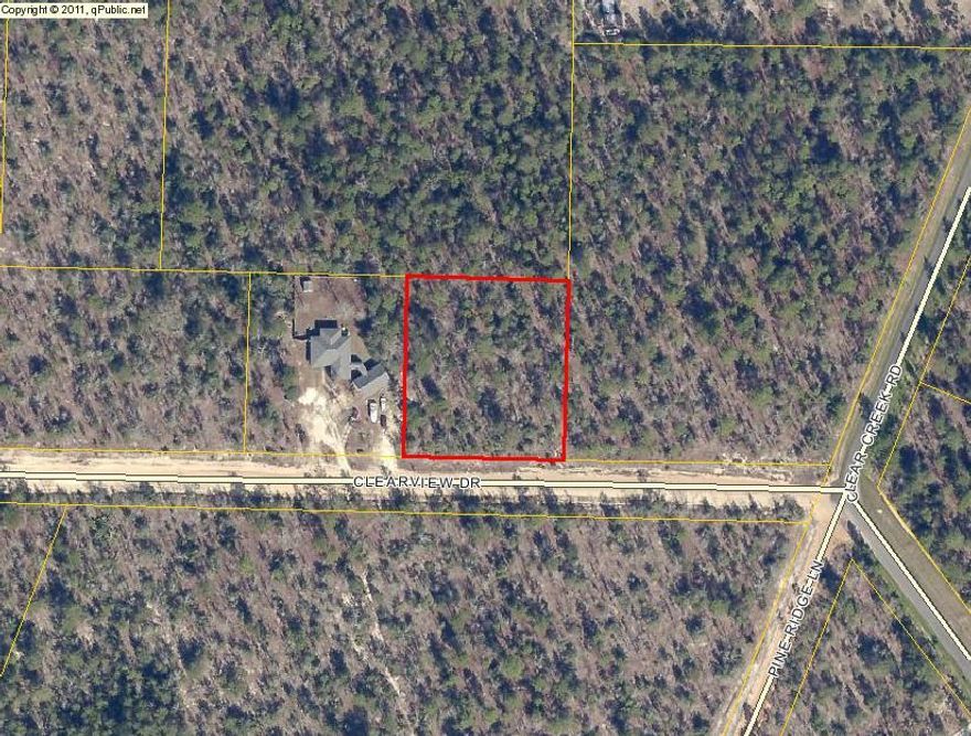 Great 1+ acre building lot in Northeast Crestview. Existing home next door so utilities are available. Short distance off of paved Clear Creek Rd.