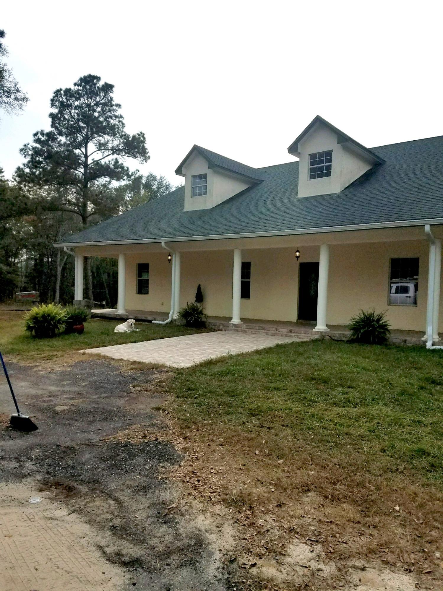 Motivated Sellers!! Price Reduced!Outdoor enthusiasts dream! Large custom built home sits on 24.5 acres with two ponds. Large oversized rooms and high ceilings. Interior has faux wood ceramic tile in the bedrooms and 18''x18'' square tiles in the living space and common areas. This home is stucco/block and built to withstand hurricane force winds! The piers on the porch are poured concrete and reinforced with steel 2x6 studs. Don''t forget the wildlife! Plenty of fishing and wildlife on your very own private retreat!Seller will also be leveling the back yard, installing a retaining wall and laying fresh sod!Buyer to verify all data, details and specifications important to them.