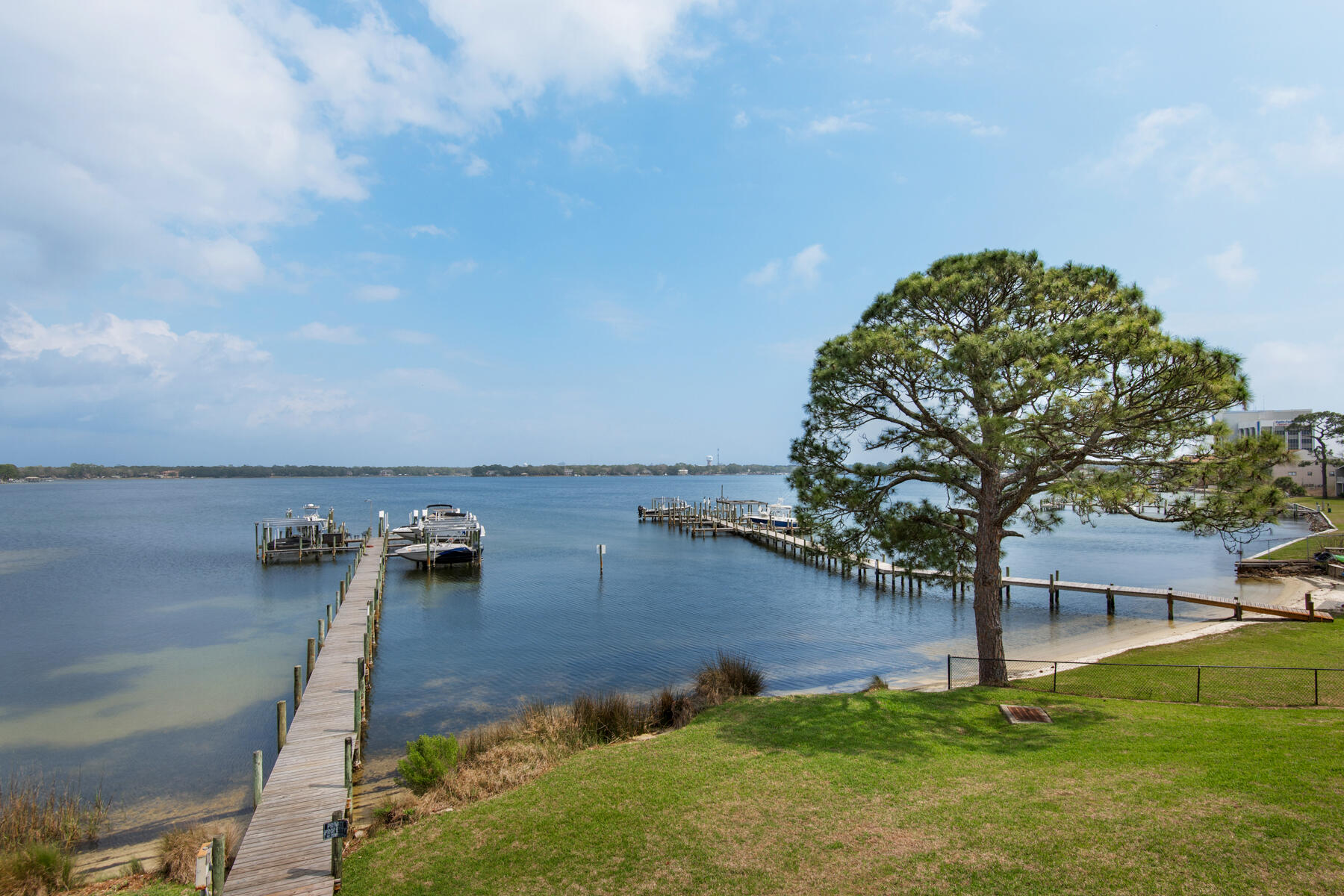 Home is under contract with a 72-hour kick-out clause. Welcome home to this beautifully renovated 3 bedroom/3 bath WATERFRONT townhome! New updates include fresh paint, new luxury vinyl plank flooring, new light fixtures, new carpet, painted cabinets, new plumbing fixtures, refinished ceilings, and more. Enjoy expansive water views from the living, dining room, kitchen on the main level and from two bedrooms with a private balcony on the second level. Relax and enjoy the tranquility of watching dolphins, water birds, and sunrises. The master suite boasts a large walk-in closet, a jetted spa tub, skylights, and a wall of windows overlooking the water. Nestled in the heart of Fort Walton Beach, this home provides year-round vacation living.