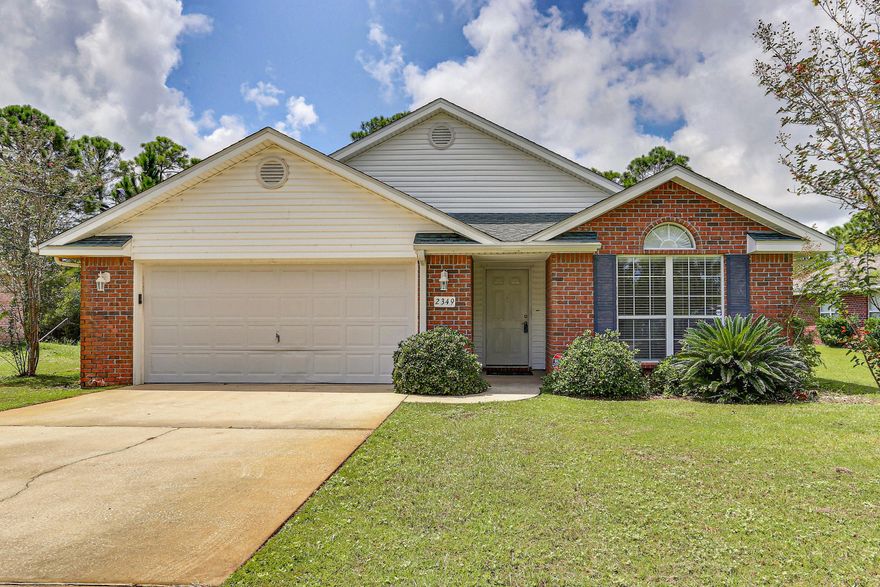 This well-maintained single-occupant brick siding home is ready for a new owner to take it to the next level. Featuring a four room, open design with vaulted ceilings this home has spacious living areas with both formal dining space and an eat-in kitchen. The kitchen is loaded with fine finished stained cabinets and counter space and features an island with a sink and dishwasher. The kitchen is also open to the family room which features a wood-burning fireplace. The roomy bedrooms are spaced in three different areas of the home. The large master suite features a walk-in closet, a master bath with a separate shower, garden tub, dual vanity, linen closet and a separate water closet. Windows tilt-in for easy cleaning and maintenance. Ceramic tile in the foyer and around the fireplace. Lawn pump and sprinkler system support the well established landscaping.