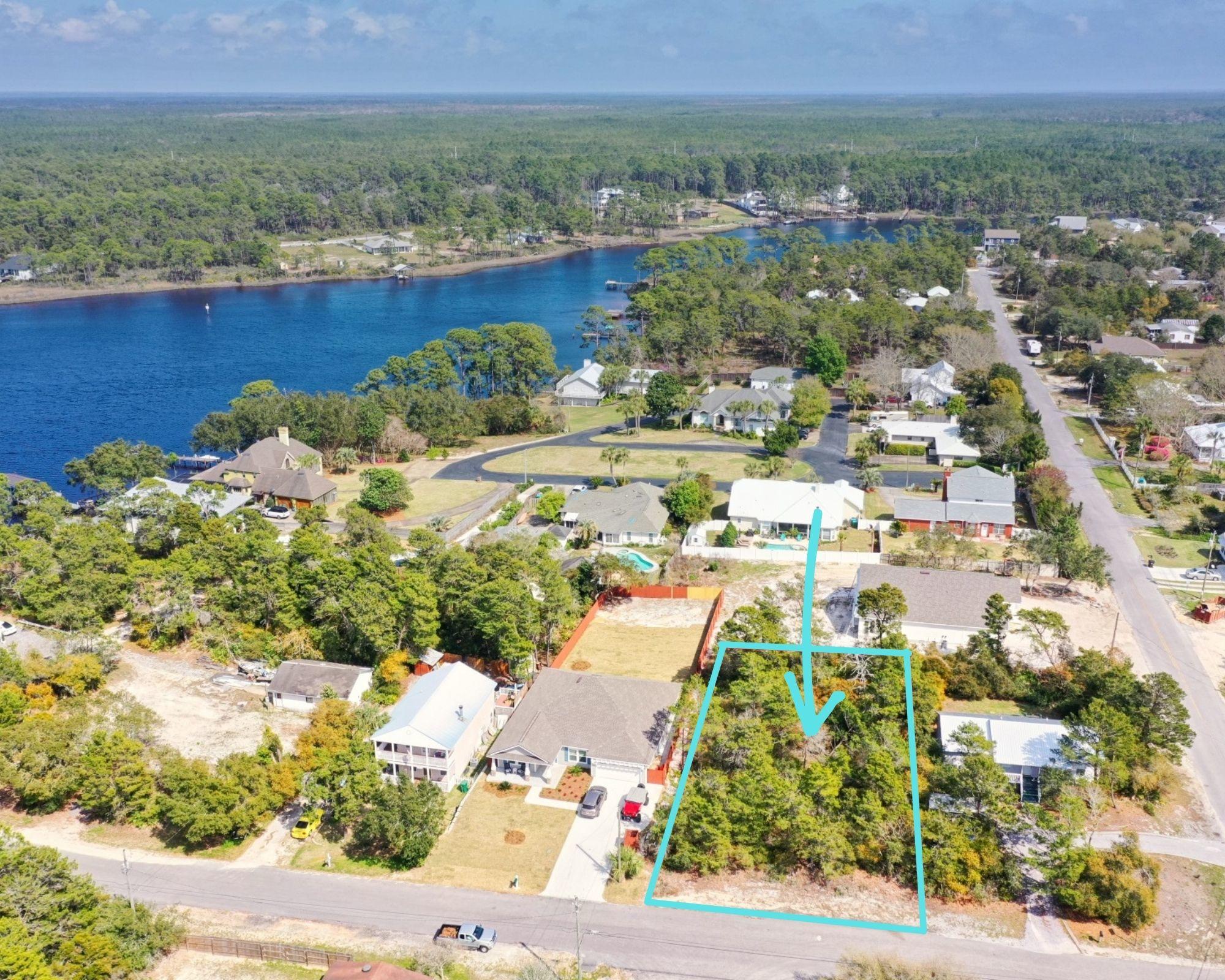 HERE IS YOUR OPPORTUNITY!!! Over a quarter acre wooded lot on the West end of the Panama City Beach near Lake Powell. This untouched lot is on a quiet dead end street and is the perfect place to build your dream home. It is located close to the shopping, restaurant, and activities of Panama City Beach and just a short stroll to all that 30A offers. NO HOA'S, away from the hustle and bustle of Back Beach Road.