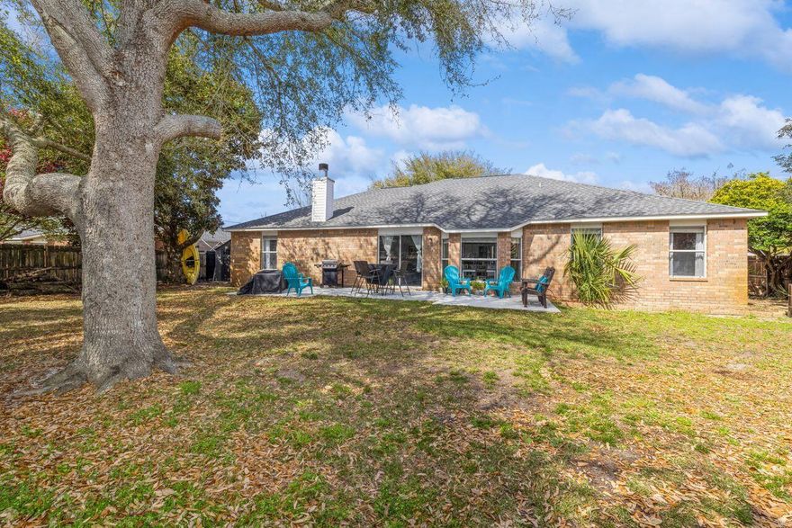 Welcome to your new haven in Navarre! Step into this well-maintained home that's ready for you to move right in. Nestled within walking distance of West-Navarre Primary School in an esteemed 'A'' rated School District, this residence offers the perfect blend of convenience and comfort.  Ideally situated near Hurlburt Field, shopping centers, and an array of restaurants, with a short 5-mile jaunt to the stunning white sands of Navarre Beach. Home offers luxury vinyl plank flooring that spans throughout the entire home, a formal dining room and an additional room perfect for an office or den, complete with stylish barn doors for added privacy.  This retreat also boasts a host of upgrades designed to enhance your lifestyle including new LG appliances in kitchen, and stone countertops