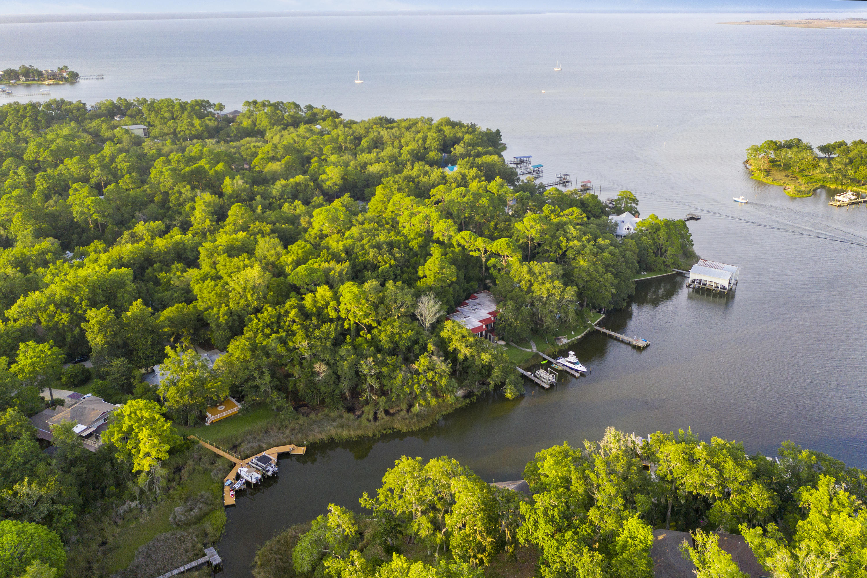 On The Bayou, vacant lot for your dream home on the water! No HOA. This amazing parcel of land has already been cleared of the underbrush but many beautiful and mature trees still remain to shade your home. Located in a very quiet neighborhood on a dead end street this gem is the perfect spot for the waterfront home you have been dreaming about. This protected cove on Mack Bayou is minutes from the Choctawhatchee Bay by boat. The bayou is also a great area for canoes or paddle boards. All of this plus a convenient location near hospital, shopping and the beaches of South Walton.