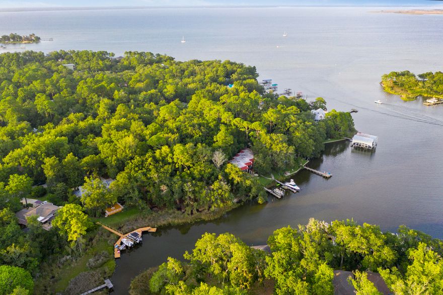 On The Bayou, vacant lot for your dream home on the water!  No HOA.  This amazing parcel of land has already been cleared of the underbrush but many beautiful and mature trees still remain to shade your home. Located in a very quiet neighborhood on a dead end street this gem is the perfect spot for the waterfront home you have been dreaming about.  This protected cove on Mack Bayou is minutes from the Choctawhatchee Bay by boat.  The bayou is also a great area for canoes or paddle boards.  All of this plus a convenient location near hospital, shopping and the beaches of South Walton.