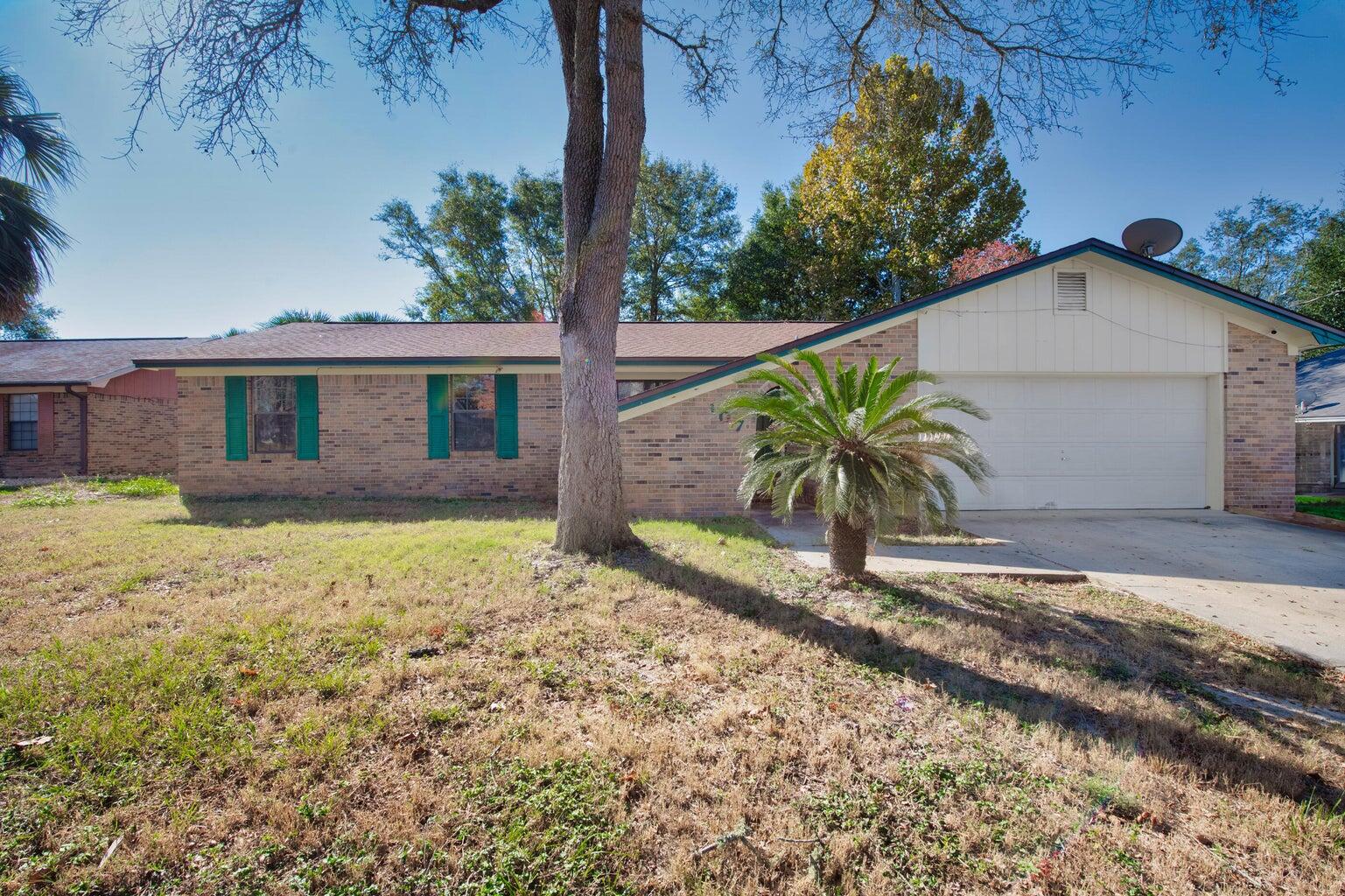 Come see this 5 bedroom 2 bathroom all brick home located South I10 in Crestview. This home offers a couple different living areas for entertaining plus a wood burning fireplace.. The well sized kitchen has gray cabinetry and soft close hinges, updated appliances. Go outside to see the large fenced backyard and 2 car garage! Pets may be considered pending owner approval and nonrefundable pet fee. No smoking allowed.