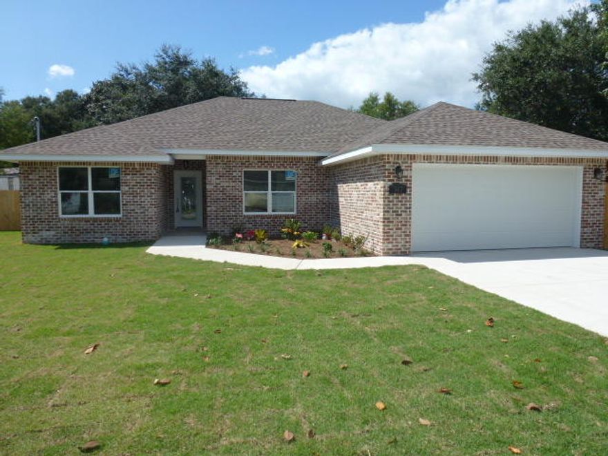 SELLER WILL Contribute $4000 TOWARD CLOSING COST. Ready for Move-In NOW!! YES,THIS STAR QUALITY, CUSTOM BUILT, ALL BRICK, SPLIT FLOOR PLAN,4 BEDROOM, 2 BATH HOME,IS COMPLETE WITH AN ARRAY OF SPECIAL FEATURES ONE WOULD HOPE FOR. MEDALLION TILE ENTRYWAY,IN LIVING/GREAT ROOM/DINING AREAS, NINE FOOT CEILINGS W/CROWN MOLDING. LIVING/GREAT ROOM TREY CEILING ACCENTED WITH ADDITIONAL CAN LIGHTING. BEAUTIFUL 48''in. WOOD DESIGN PLANK TILE FLOORING THROUGH-OUT THE ENTIRE HOME,YES BEDROOMS INCLUDED! HIGH BASE BOARDS, BEAUTIFUL ARCHED DOOR WAYS WITH FINISHED BULL NOSE CORNERS.CEILING FANS NOT ONLY IN LIVING/GREAT ROOM AND MASTER SUITE BUT ADDITIONAL BEDROOMS TOO! FULLY LOADED GALLEY KITCHEN IS EQUIPPED WITH STAINLESS STEEL APPLIANCES,CUSTOM BUILT CABINETS AND GRANITE COUNTER TOPS.