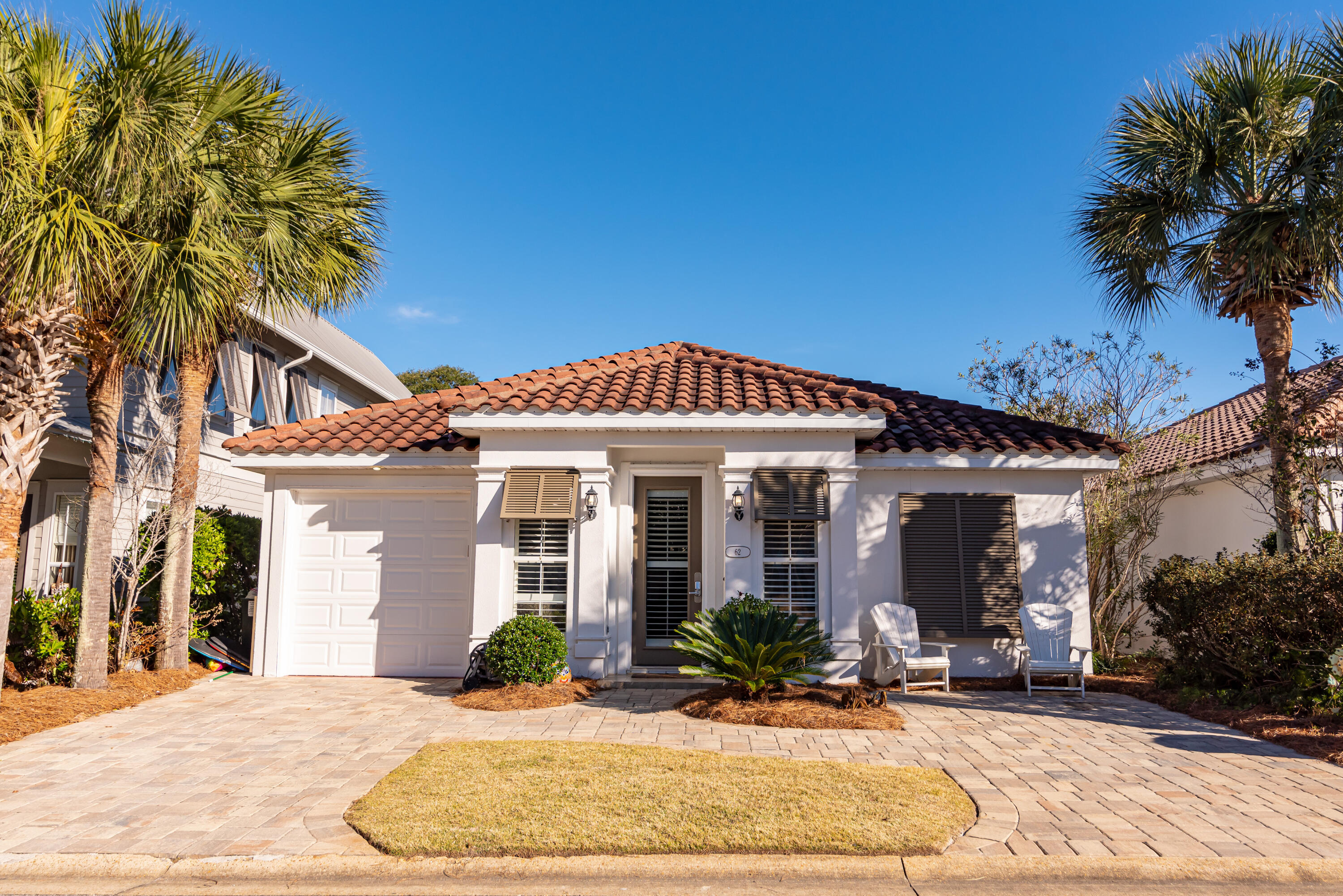Welcome to Destined For Fun in the Upscale, gated Community of Emerald Waters Village. This is an updated 3 bedroom 2 bath home with attached garage sold fully furnished, making this a very comfortable home to live full time or transition right into Short Term Rental. Enjoy the Enclosed back porch with comfortable seating and a large screen TV. Interior is designed with an abundance of natural, modern textures and themes. Primary Suite has en-suite bath with double vanity and large tiled shower. Guest bedroom with Custom bunks and another guest bedroom with access to porch. Emerald Waters boasts 2 Community Pools, lots of green space and Deeded Beach Access. Located nearby to Beach front Restaurants, coffee shops and shopping. Enjoy Golf, Tennis, Water Sports, Fishing and more in the area