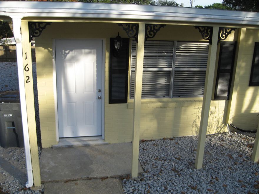 Very tastefully remodeled duplex. Electric and plumbing have been updated. Ceramic tile flooring throughout. Fresh paint. Kitchen has refrigerator, range, dishwasher and nice pantry. Large closet in bathroom. Living room and bedroom have ceiling fans. Unit has been updated with new technology Mitsubishi ENERGY STAR ductless air conditioning and heating system for low electric bill. Inside utility room with washer dryer hookup and plenty of storage. Nice deck on back of unit. Gravel parking area for 2 vehicles. Owner provides lawn service.