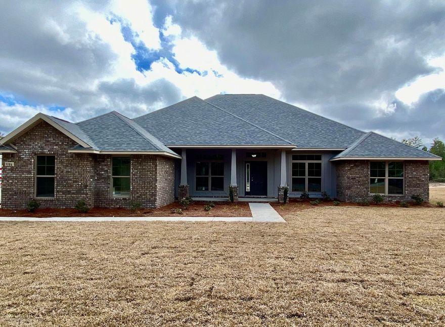 Our popular 3019sqft home sits on 1 acre with a 3-Car side-entry garage. This plan features larger bedrooms and an open design, with a beautiful kitchen that overlooks the spacious Great Room. The kitchen is adorned with custom-made maple cabinets, recessed and under-mount lighting, granite countertops, stainless steel appliances, and a large walk-in pantry. A wide Florida Room with large windows overlooks a backyard with privacy behind. This home is energy efficent with a 14 seer HVAC and low-E vinyl windows. Nichols Creek has easy access to I-10, and the sugar-sand beaches of Navarre are less than a 30-minute drive away!
Thomas Homes was the winner of multiple Parade of Homes awards in 2017, and has been claim-free since 1993!