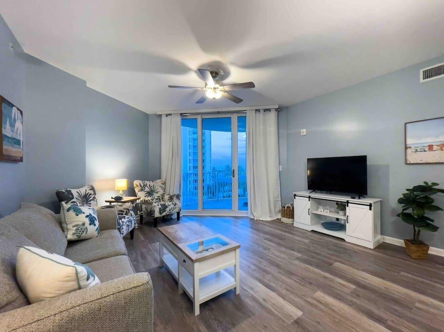 Welcome to the desirable Pool View Condo, not a parking lot view!! Updated junior suite with brand new LVP Flooring, Freshly Painted, All new Fixtures, New Furnishings, Decorations, Curtains, Comforters and a new Refrigerator and Dishwasher. You have 2 bedrooms, 1 with a king bed, access to the patio and the other bedroom with full size bunkbeds. Both bedrooms have private access to the full bathrooms with the master bathroom having a tub/shower combo and the bunk room bathroom having a tiled walk in shower. This unit has an open concept and in the family room there is a queen size pull out couch. The kitchen has granite counter tops, a breakfast bar and an eat in breakfast area. The balcony overlooks the beautiful pools and is perfect for relaxing and taking in the sights of the pool.