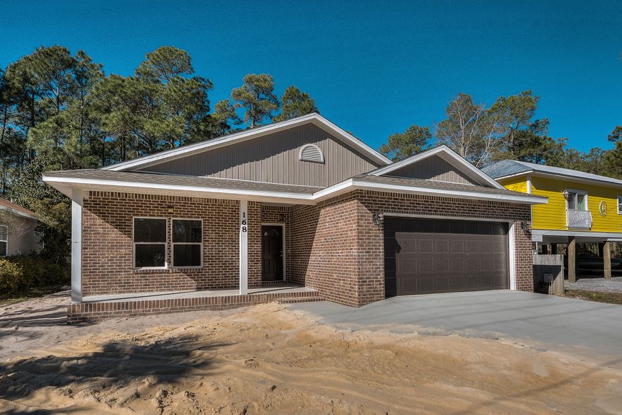 New CONSTRUCTION Home is complete except some minor touch-up and landscaping.. Convenient location to beaches and To shopping. Home has 2 car garage , and separate dining room off kitchen. This home offers granite counter tops, and great floorplan.