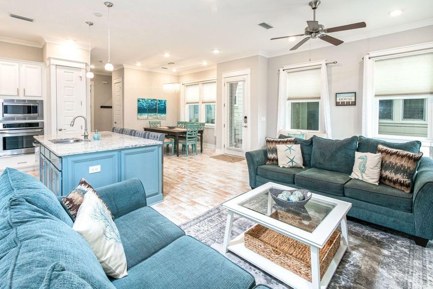 This stunning 3 bedroom/2.5 bath luxury townhome is the ultimate place to call home or is a great option for a secondary home or investment property. The Bahama floorplan is the most desirable and largest of the floorplans in Prominence, and this one backs up to neighborhood preserve space. Enjoy the first level open and spacious living area with bright white and coastal colors reflected in the furnishings, the granite counters, glass subway tile backsplash, and hardwood floors. The kitchen, living, dining area, half bath and laundry room are all on ground level. Upstairs you will find the master bedroom with full ensuite bath, walk-in closet and two additional bedrooms and guest bath. The 2-car garage is handy to store your golf cart, bikes, and beach toys. With excellent rental history, this immaculate home is being offered fully furnished with a 6 seat Golf Cart. The village of Prominence triplexes is centrally located on 30A between Rosemary Beach and Seaside with access to the HUB, an outdoor venue of shops restaurants and entertainment. Enjoy access to the world's most beautiful beaches, miles of forest trails, a paved biking/running trail along the entire length of 30A. The $300 per month HOA fee covers exterior insurance, landscaping, security, resort style pool, grilling area, fitness center, and private seasonal beach shuttle service.