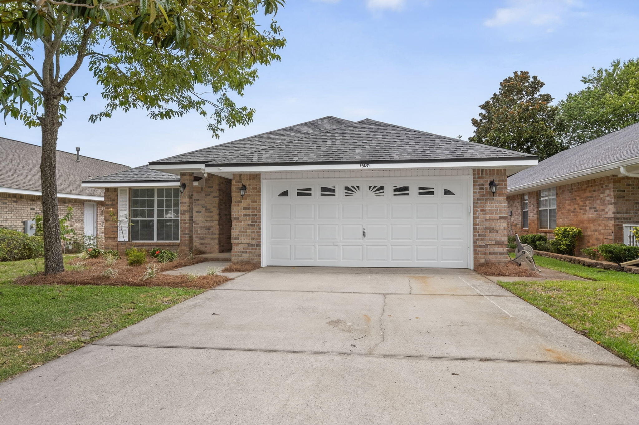 Welcome to 1608 Sutton Place - a beautifully updated 4 bedroom, 2 bath brick home offering stylish comfort in the heart of Fort Walton Beach!Step inside and immediately feel at home with the fresh, modern updates throughout. The spacious open-concept living area is enhanced by brand-new LVP flooring, fresh paint, updated lighting, and a cozy gas fireplace, perfect for both relaxing nights in and entertaining guests.The kitchen has been tastefully refreshed with elegant quartz countertops, stainless steel appliances including a new stove and microwave, and an abundance of warm wood cabinetry. The new fixtures and updated hardware add a modern touch, while the breakfast bar offers additional seating and flow into the living space. Retreat to the private primary suite with plush new carpeting, a large walk-in closet, and a refreshed en-suite bathroom boasting updated quartz counters, dual sinks, framed mirrors, and new fixtures.
All secondary bedrooms offer fresh carpet and neutral paint, giving you move-in-ready flexibility for guests, a home office, or playroom. The second full bath mirrors the same tasteful updates for a cohesive feel throughout the home.
Additional highlights include Brand-new roof and HVAC system for peace of mind, Spacious laundry room with storage, 2-car garage and wide driveway and covered back patio.
Conveniently located near schools, shopping, dining, and both Eglin AFB and Hurlburt Field, this home truly checks all the boxes.
Don't miss this turnkey opportunity, schedule your private showing today!