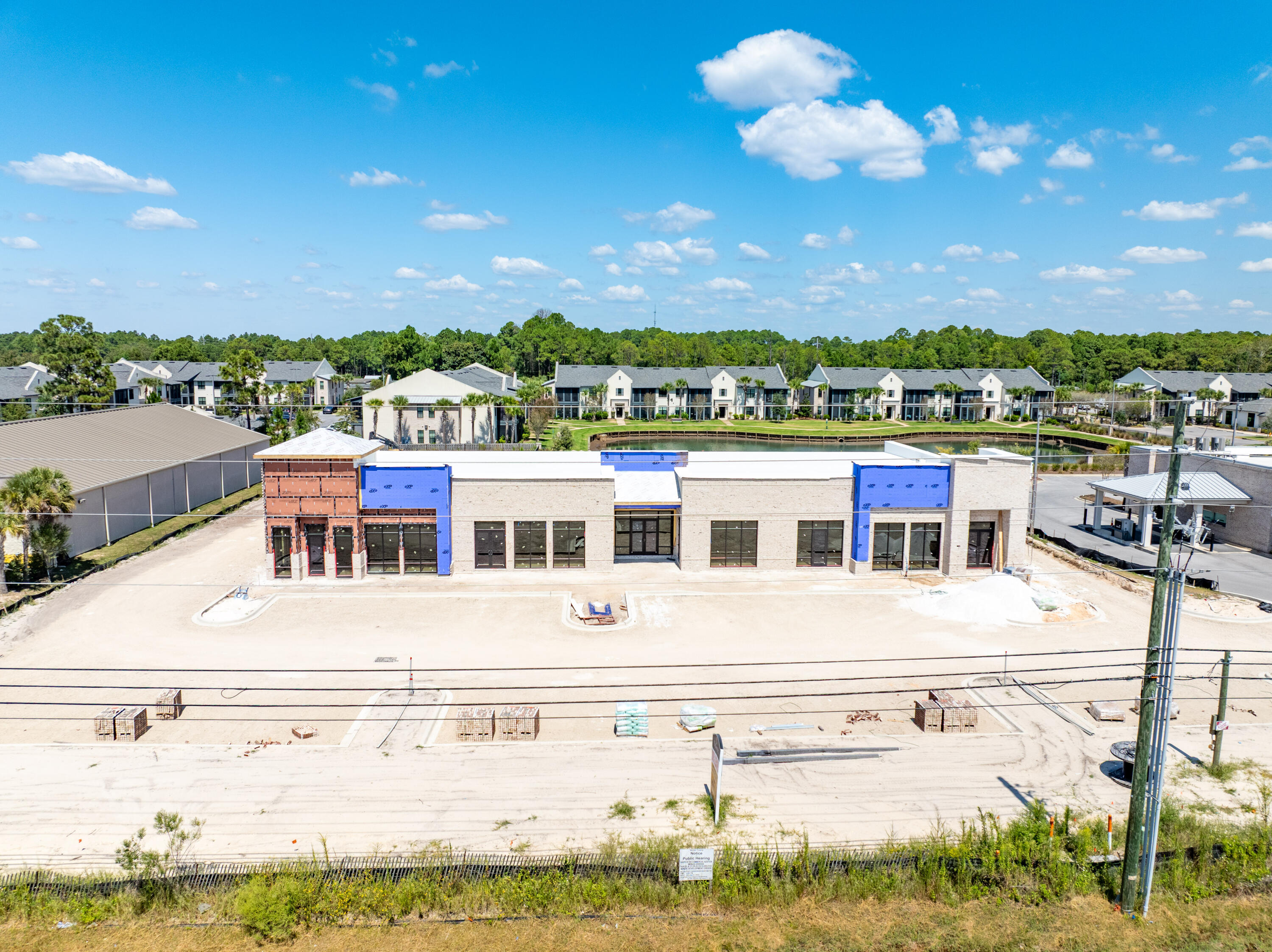 ~11,246 Square Foot Subdividable Building with a Drive-Thru! (listing price involves the anchor space at +/-4,155 square feet) 239' of Highway 98 frontage enjoying the benefits of an existing deceleration lane and access to a traffic light! One of the most premier sites located in South Walton County of Santa Rosa Beach, Florida. This 1.5-acre parcel, zoned Village Mixed Use, is identified on the uploaded plat as 'Parcel B' of the mixed-use development known as The Shops of 393. This outparcel commands significant visibility from a traffic count of approximately 45,000 vehicles daily. Please inquire for further details.